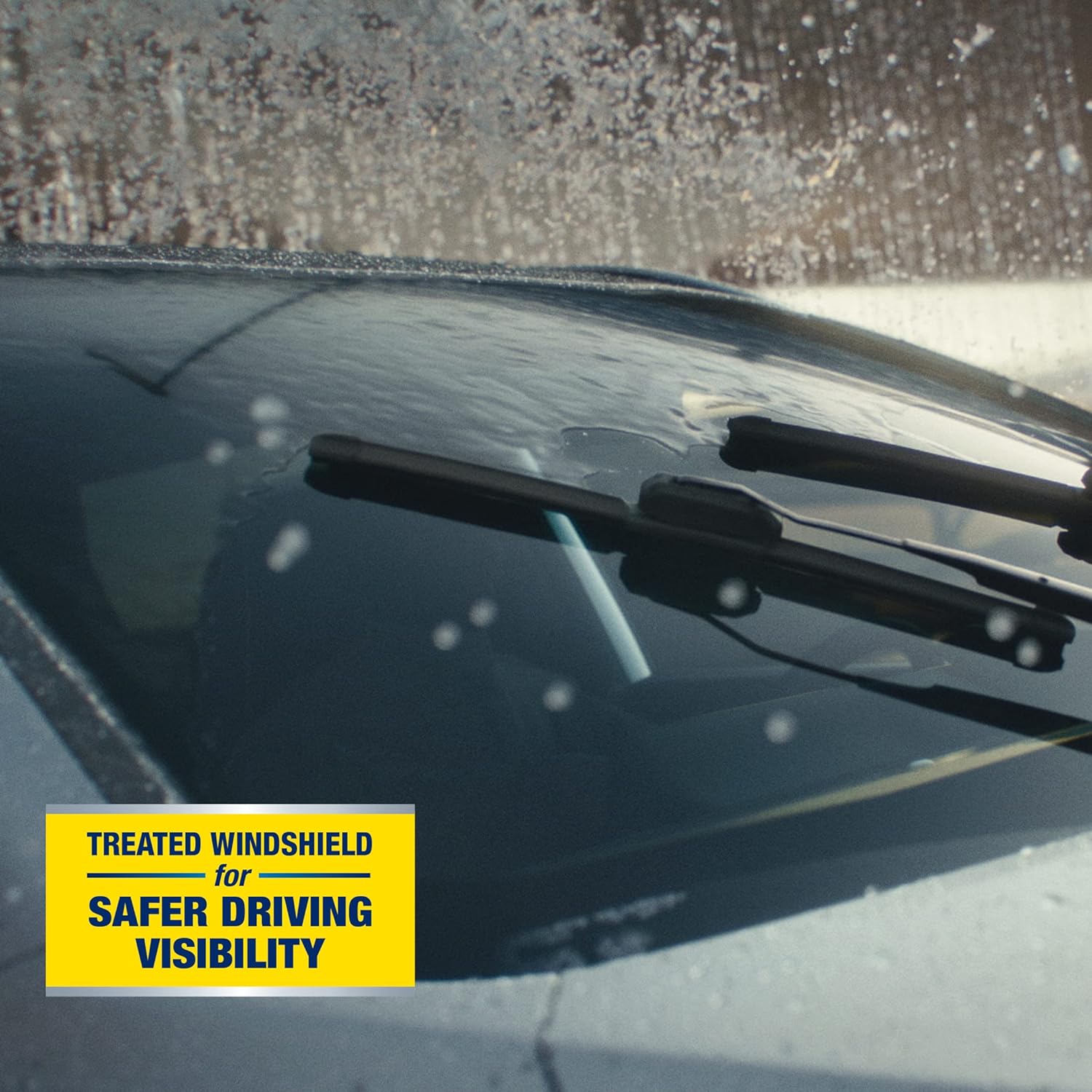 Highlights the safety benefit of a treated windshield for improved driving visibility in adverse weather conditions.