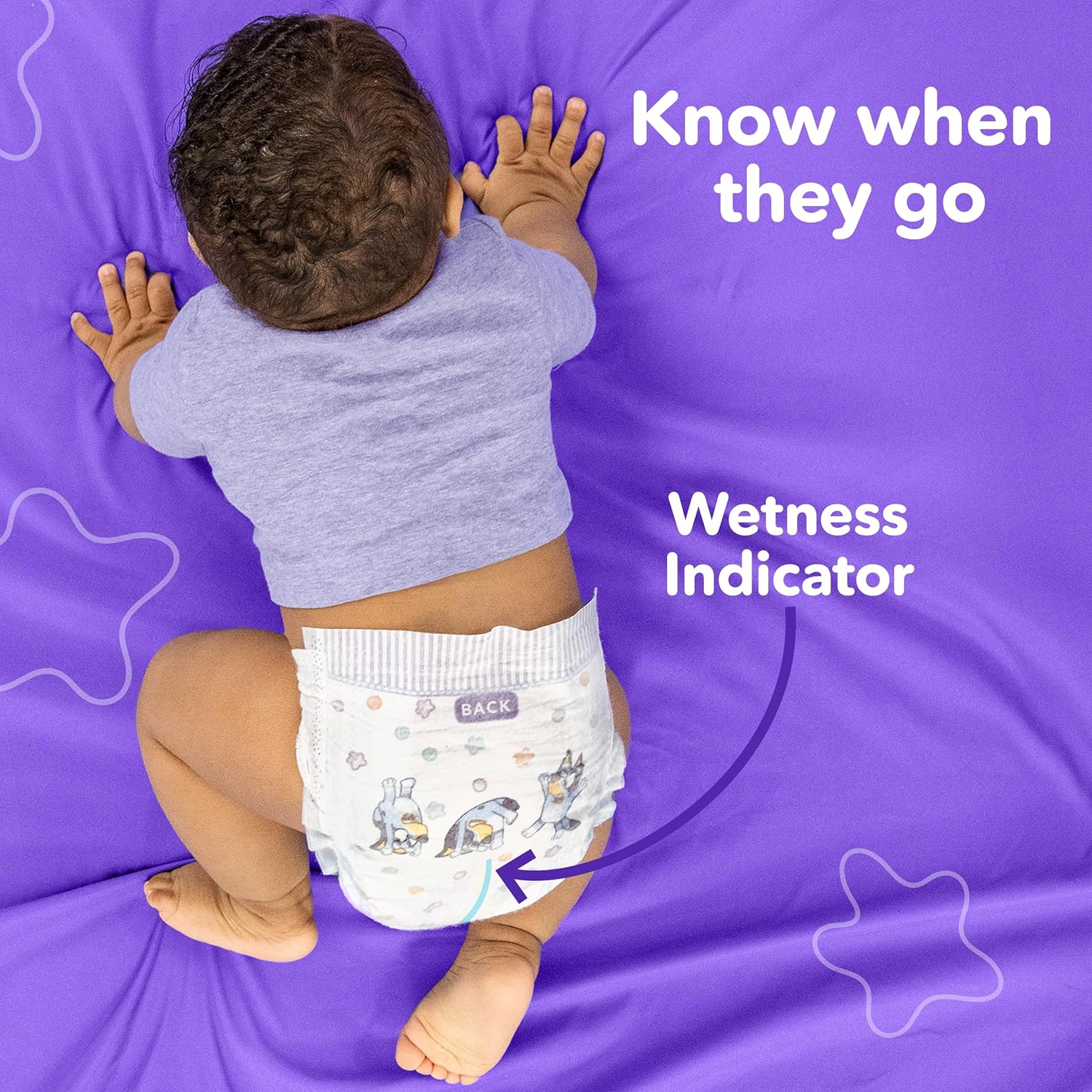 Highlights the diaper's wetness indicator feature, helping parents know when it's time to change the baby.