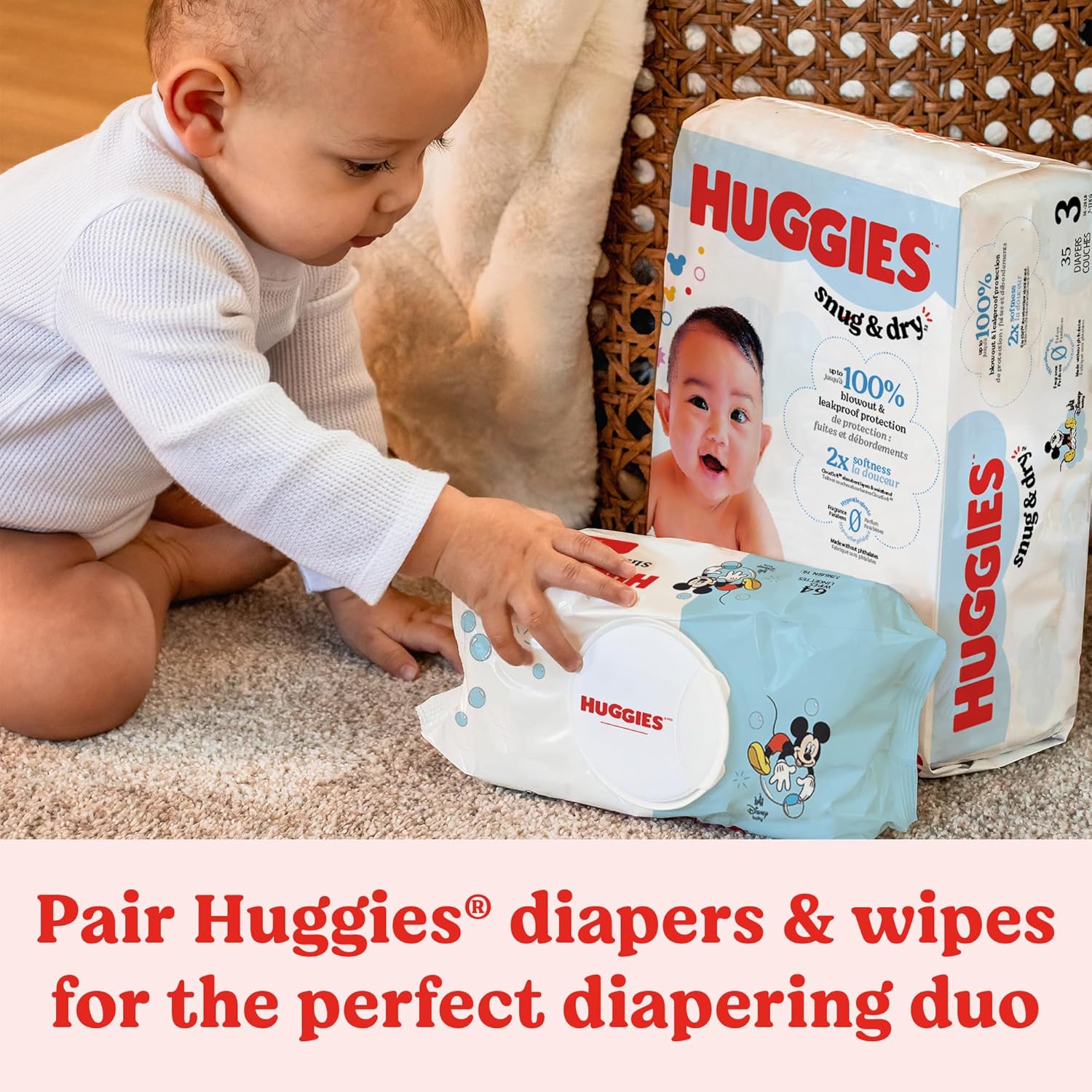 Shows a real baby interacting with Huggies products to build trust and relatability with parents. Demonstrates that Huggies diapers and wipes are designed to work together as a complete diapering…