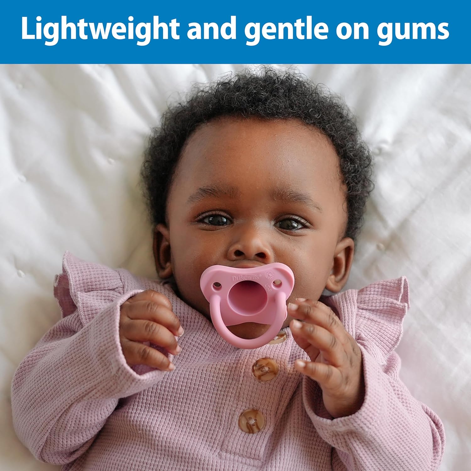 Highlights that the pacifier is lightweight and gentle on the baby's gums, reassuring parents about the product's safety and comfort.
