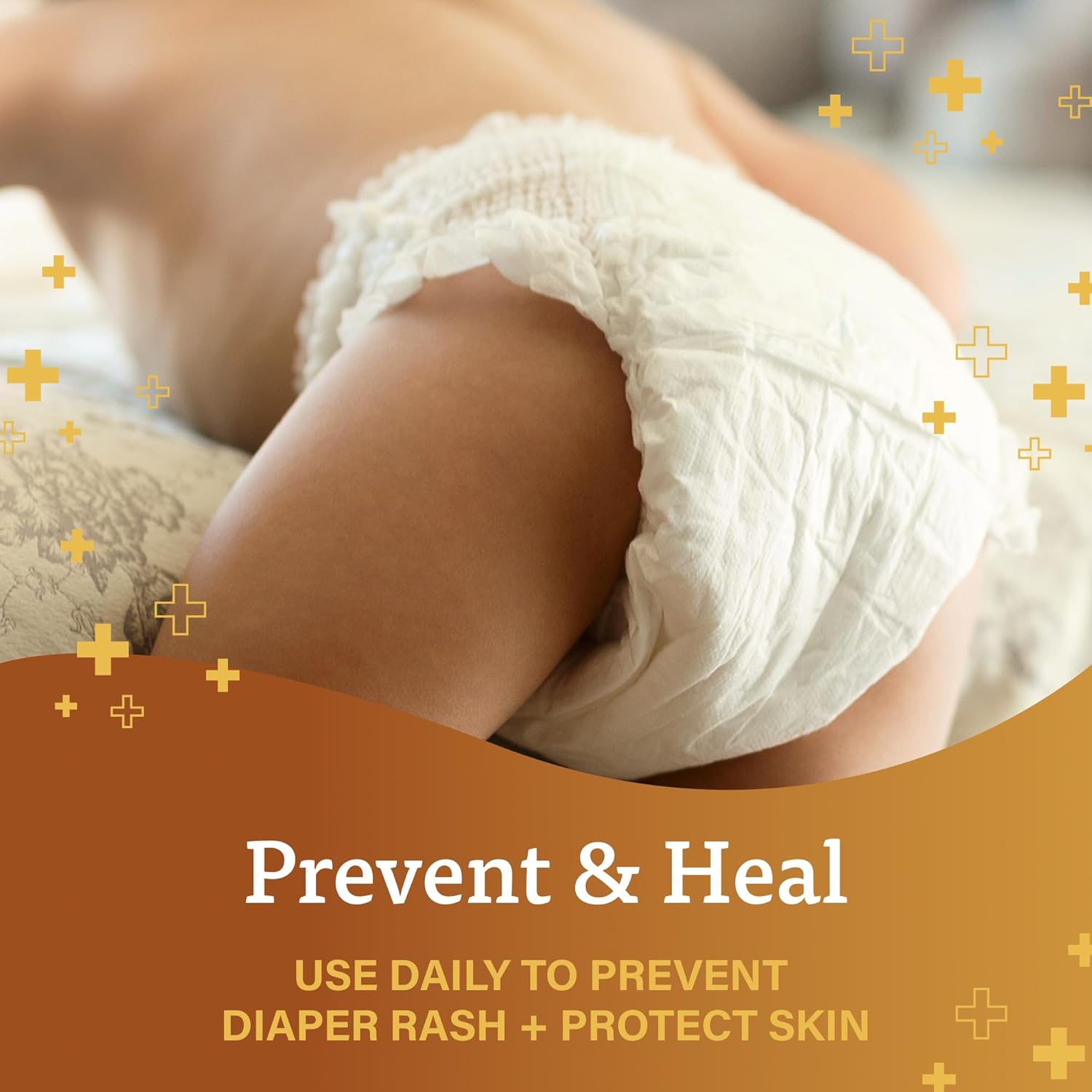 Highlights the product's ability to prevent and heal diaper rash, reassuring parents about protecting their baby's skin.