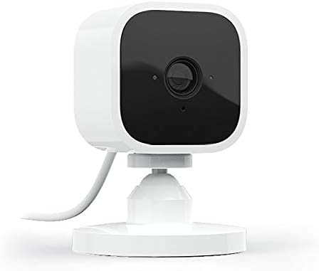 Shows the small, unobtrusive nature of the security camera in a home setting.