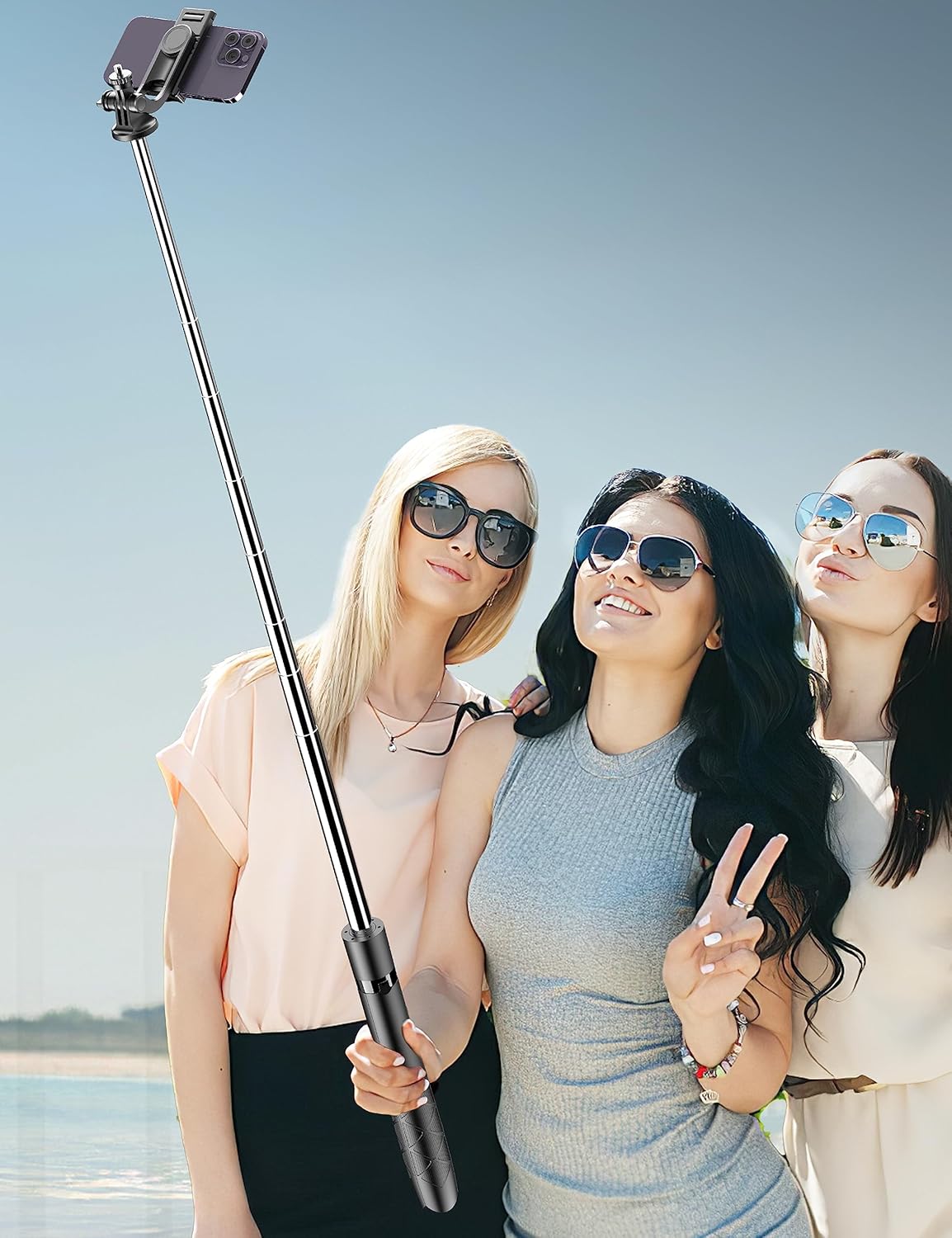 Demonstrates the selfie stick's ability to capture group photos and its suitability for outdoor activities. Shows the product being used in a real-world context, emphasizing its relevance for social…