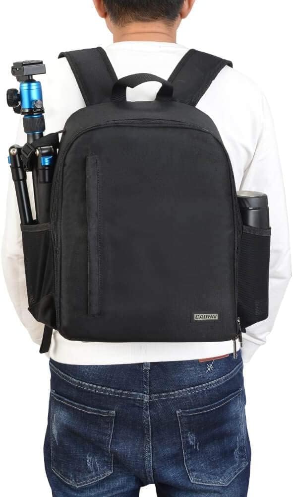 Demonstrates the backpack's ability to securely store and transport camera equipment, highlighting its practical use for photographers.
