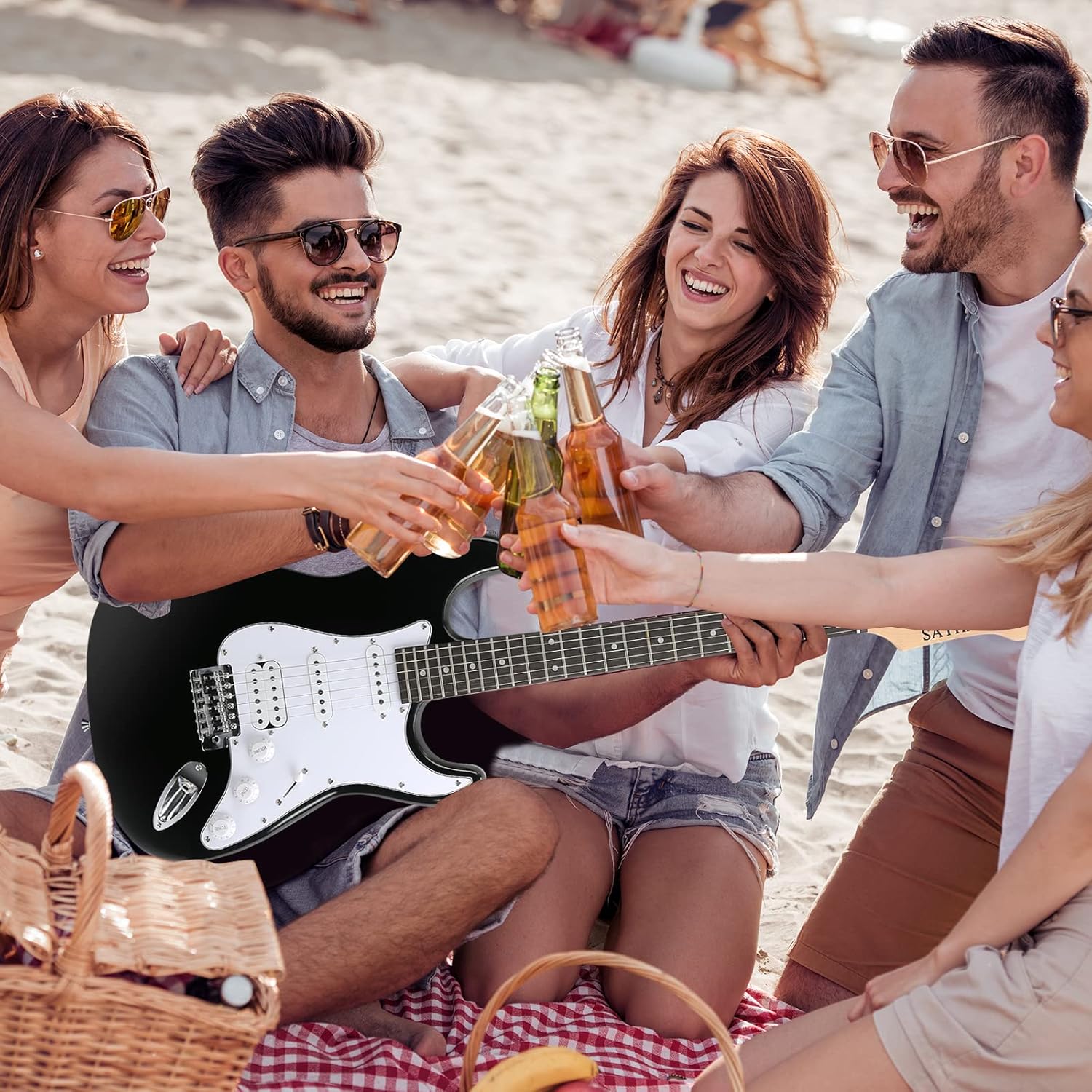 Shows the product being used in a fun, social beach setting to demonstrate its versatility and appeal for outdoor gatherings. Depicts a group of friends enjoying music and drinks on the beach,…