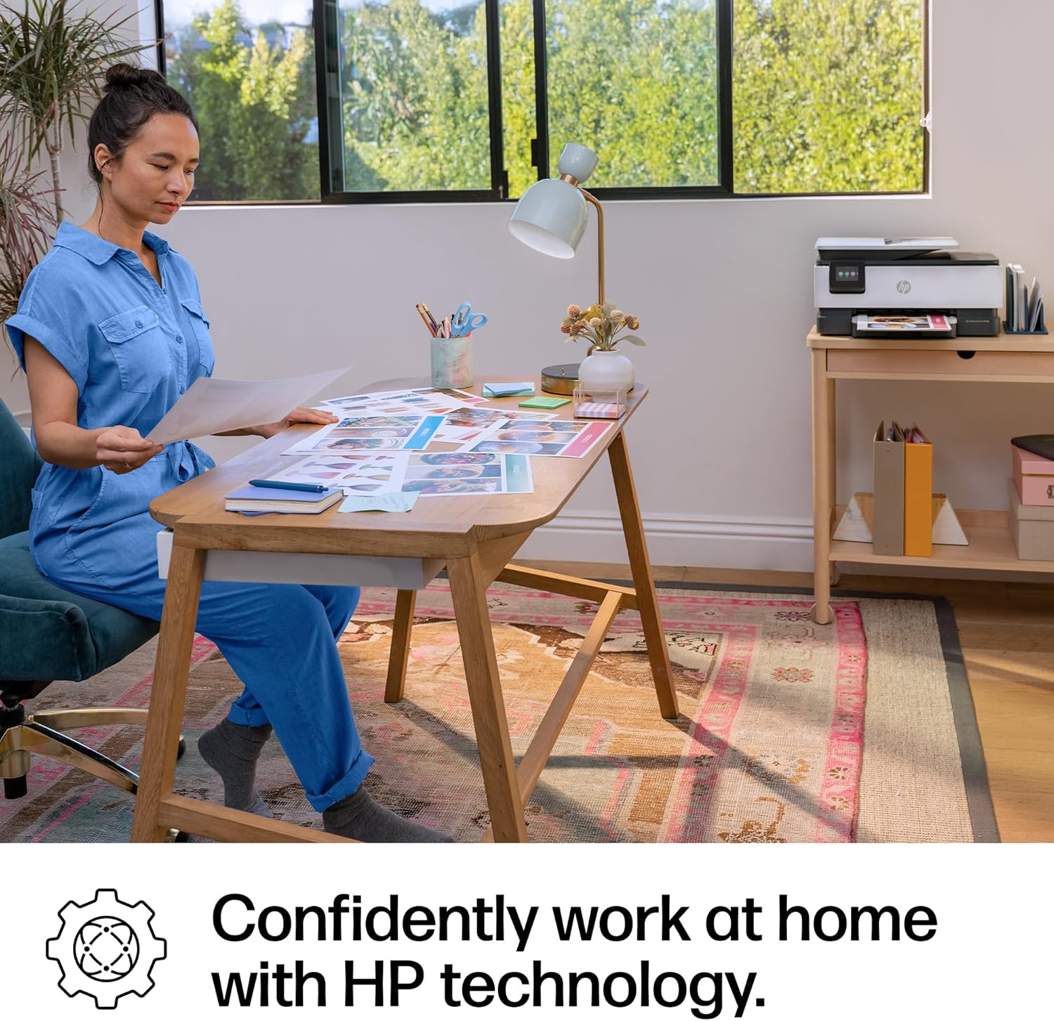 Shows the product in a real home office environment to demonstrate how it fits into a work-from-home lifestyle. Illustrates how HP technology enables confident and productive work from home.
