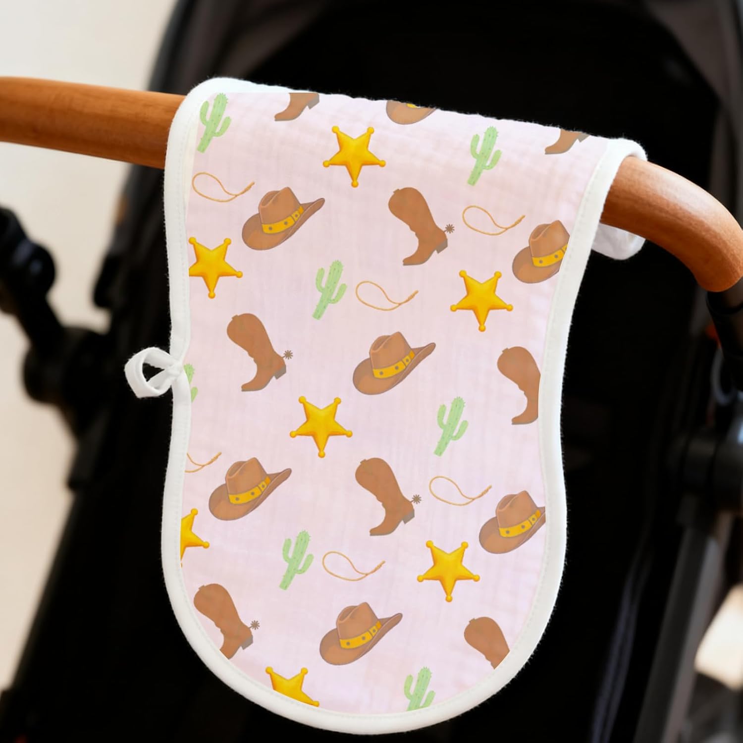 Showcases a baby product with a fun western-themed pattern, appealing to parents looking for cute and themed baby items.