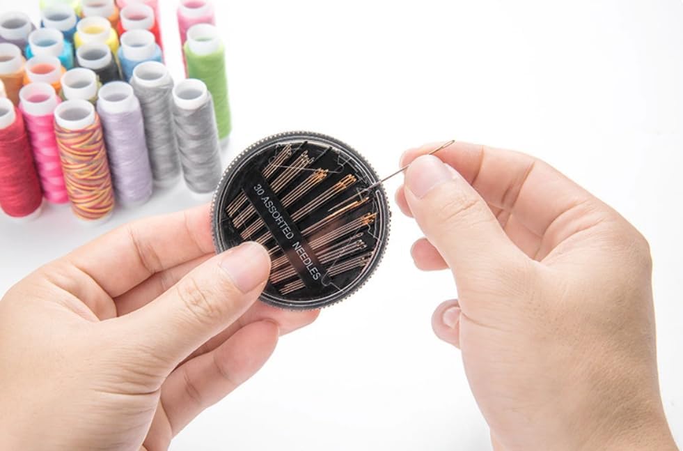 Shows the variety of needles included in the sewing kit, demonstrating the product's versatility for different sewing needs. Demonstrates how to use the product by showing hands threading a needle,…