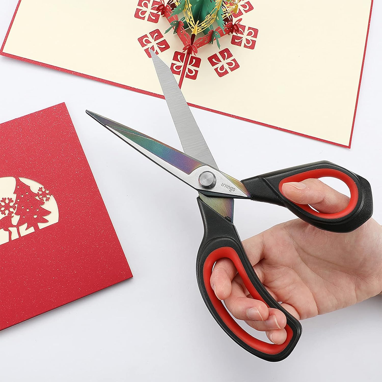Shows the product being used to create Christmas-themed crafts, highlighting its suitability for holiday projects.