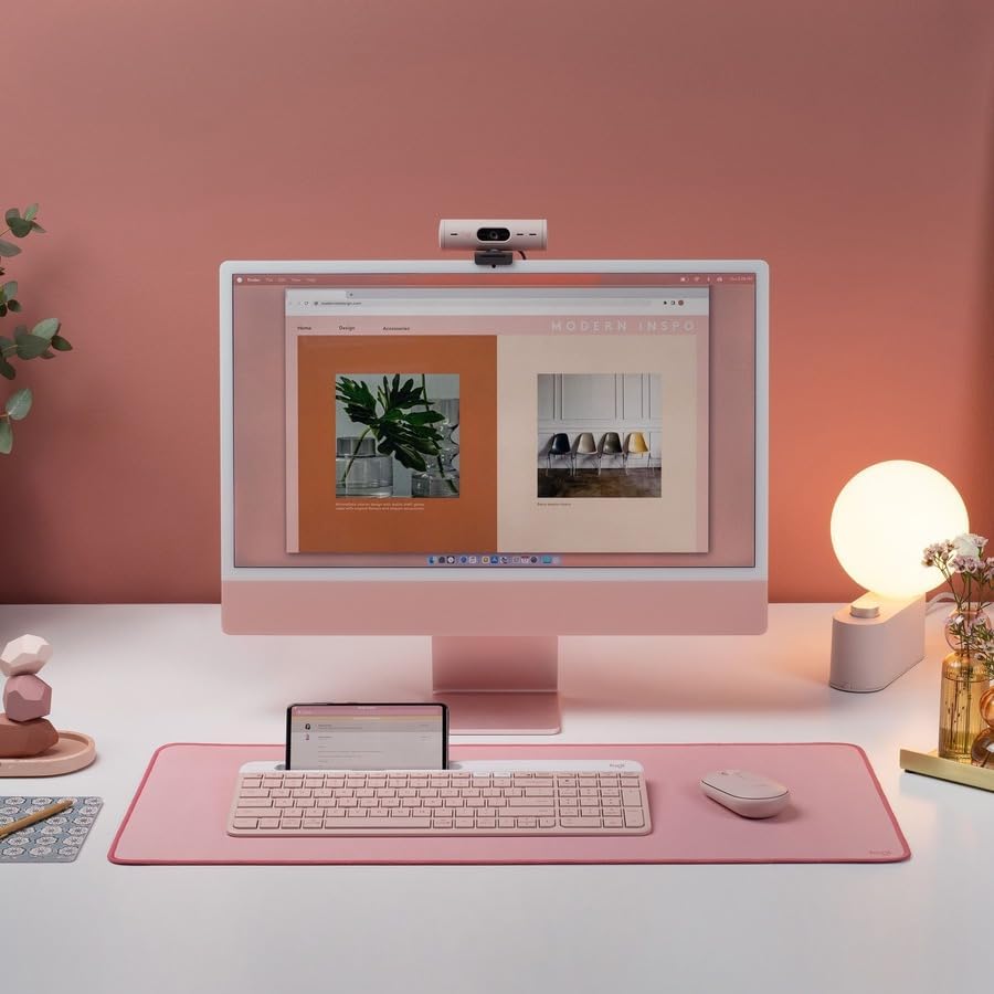 Showcases a stylish and organized home office setup to appeal to customers looking for a cohesive and visually pleasing workspace.