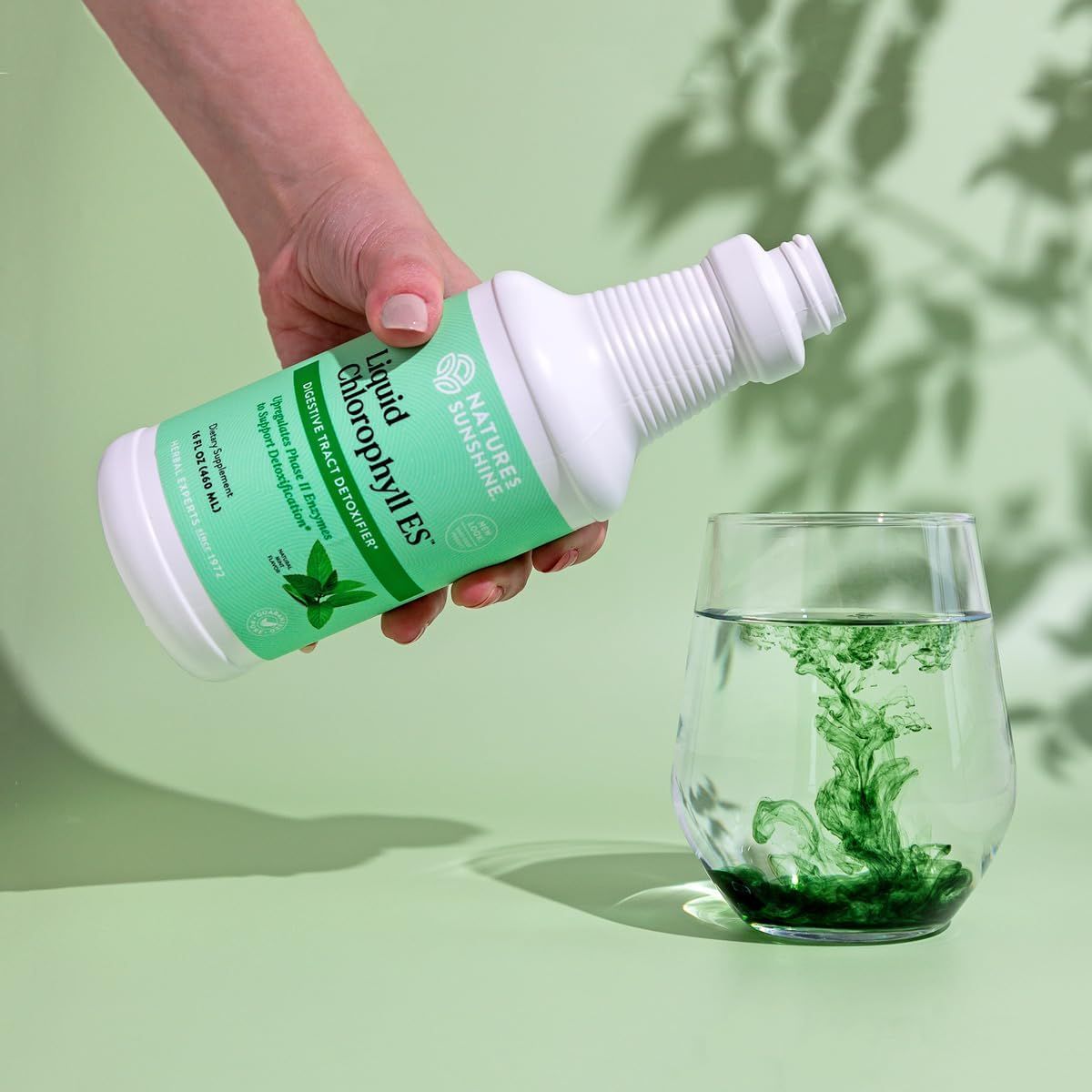 Highlights the product's key ingredient (liquid chlorophyll) and suggests its natural, plant-based properties.