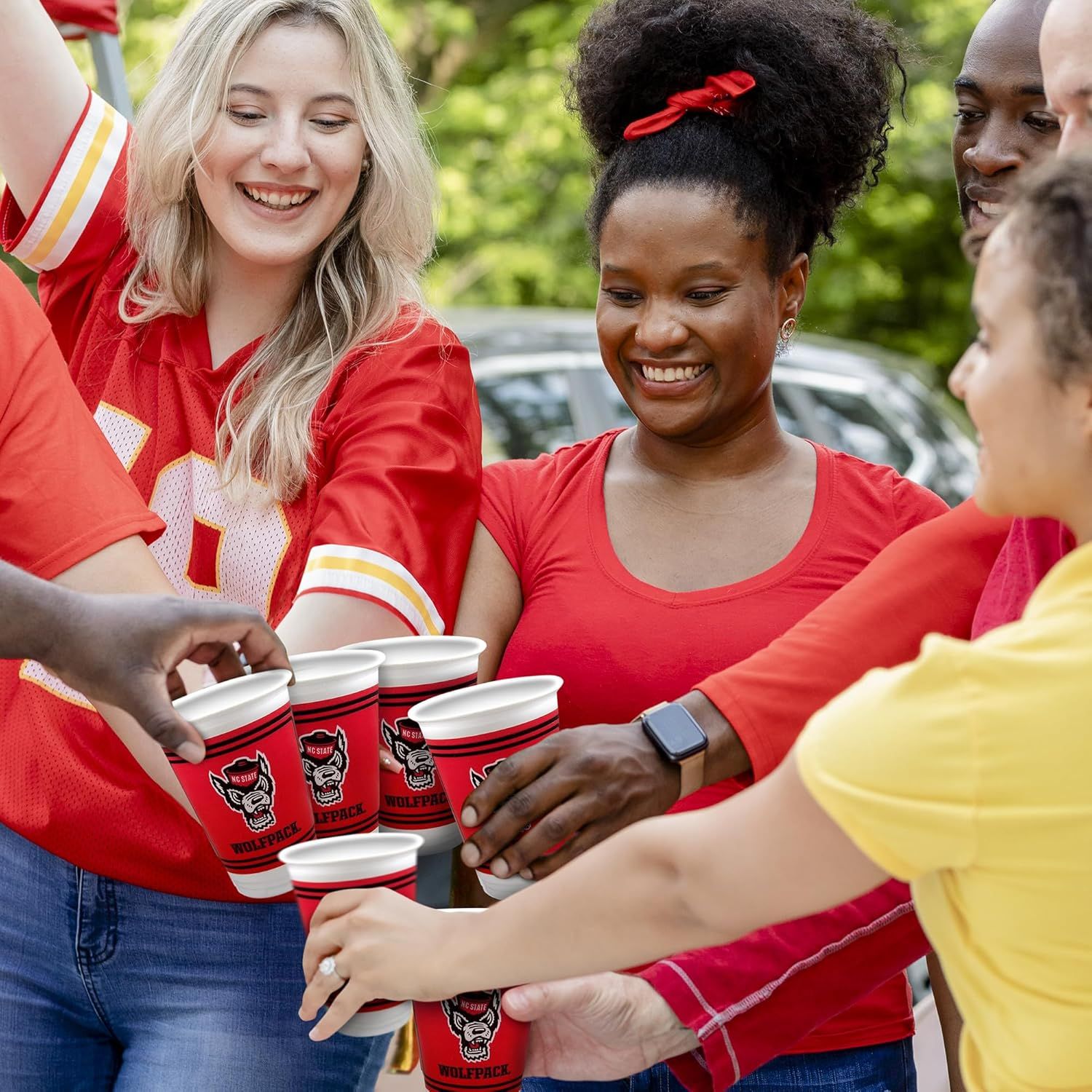Demonstrates the product is perfect for social occasions like tailgating and sports events, showing its versatility in group settings.