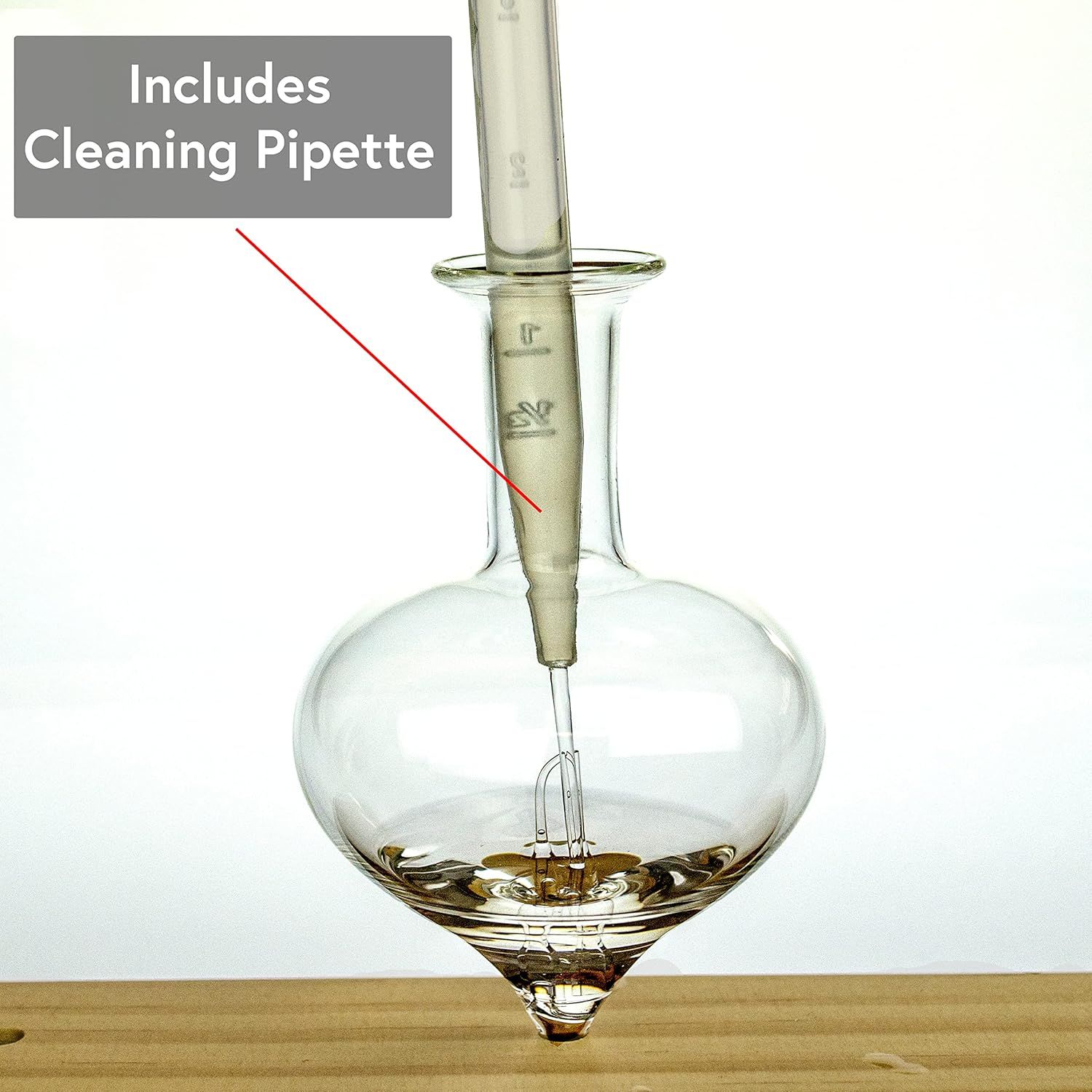 Informs the shopper that a cleaning pipette accessory is included with the product, adding value and clarifying what comes in the package.