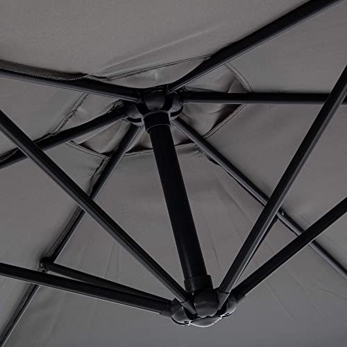 Highlights the internal structural design and engineering of the umbrella frame, showing the quality of construction and durability of the hub and rib system.