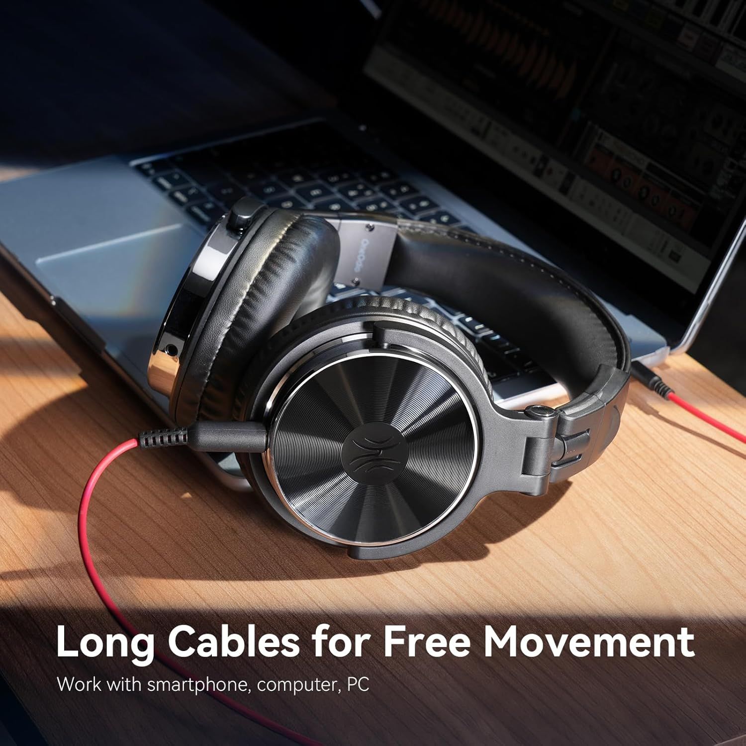 Communicates that the headphones have long cables allowing users to move freely while connected to their devices without restriction.