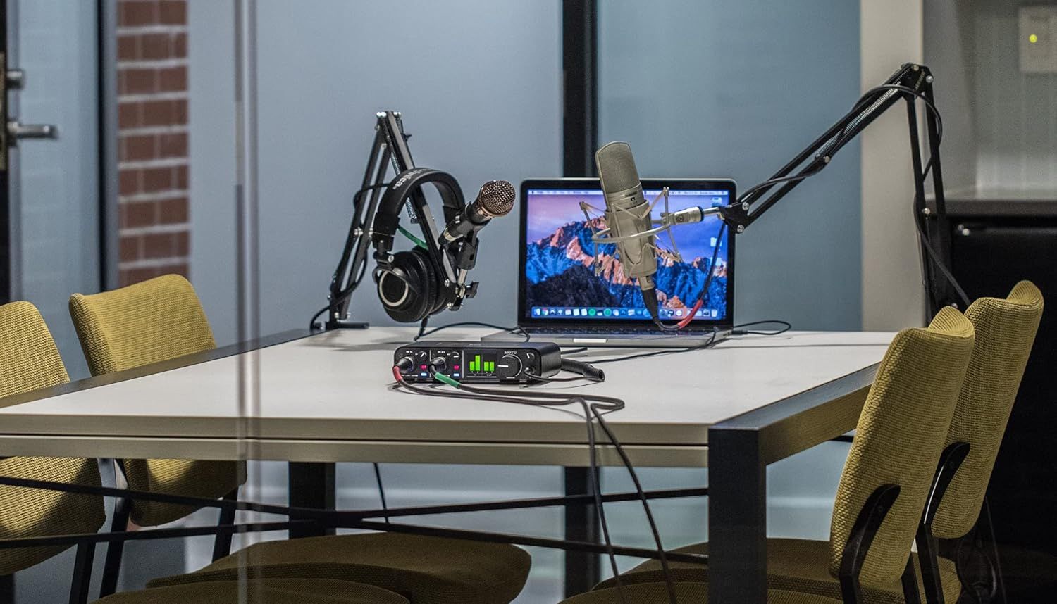 Demonstrates the product in a professional podcasting or recording environment to show its real-world application and versatility for content creators.