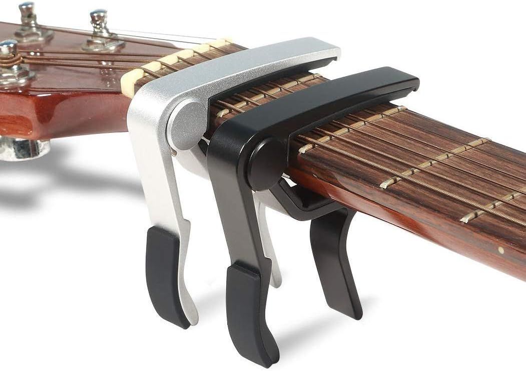 Shows the customer that they receive two guitar capos in different colors (silver and black) with their purchase, demonstrating the value and options included…