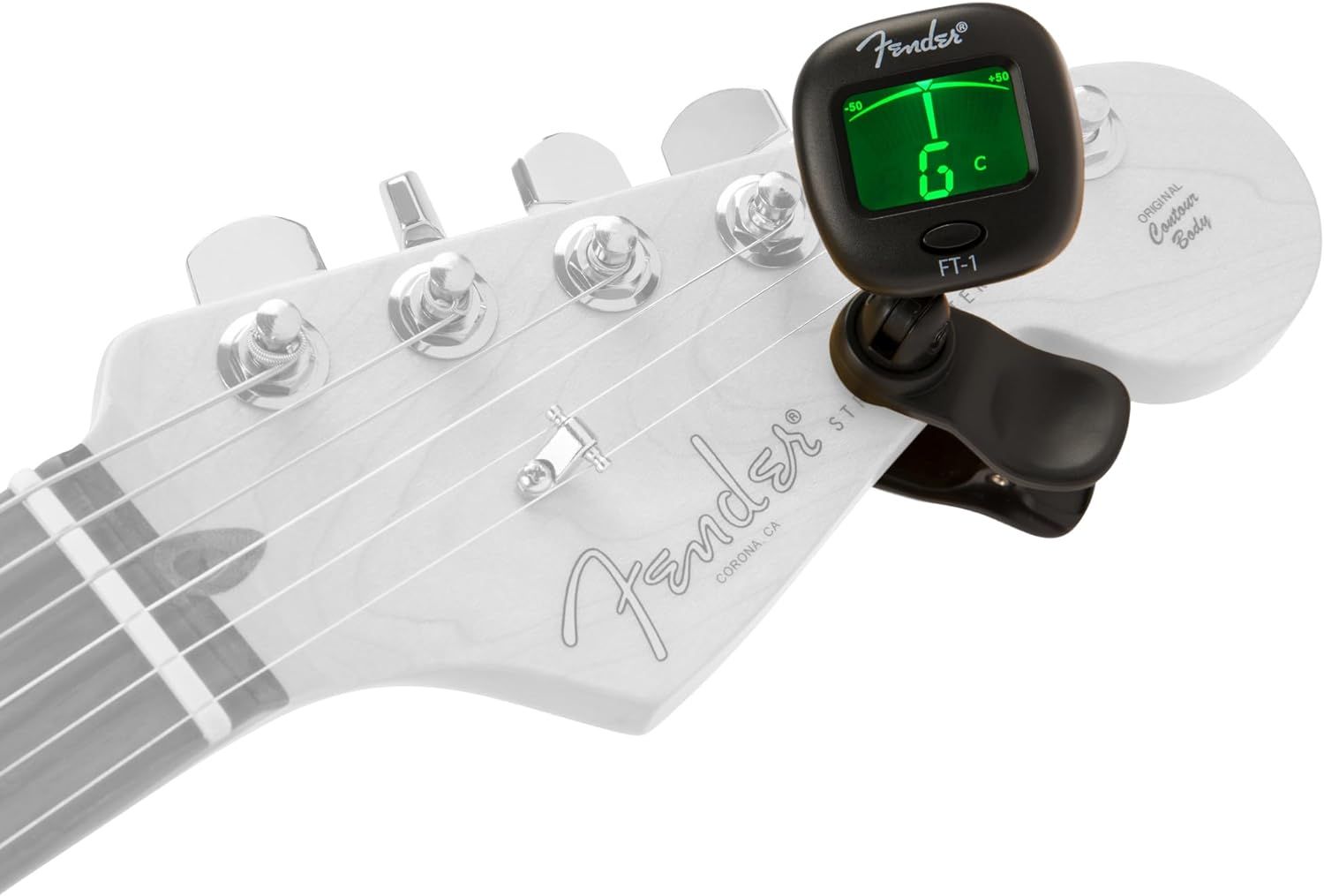 Shows the Fender guitar tuner clipped onto a guitar headstock in a real-world usage scenario to help shoppers visualize how the product attaches and functions.