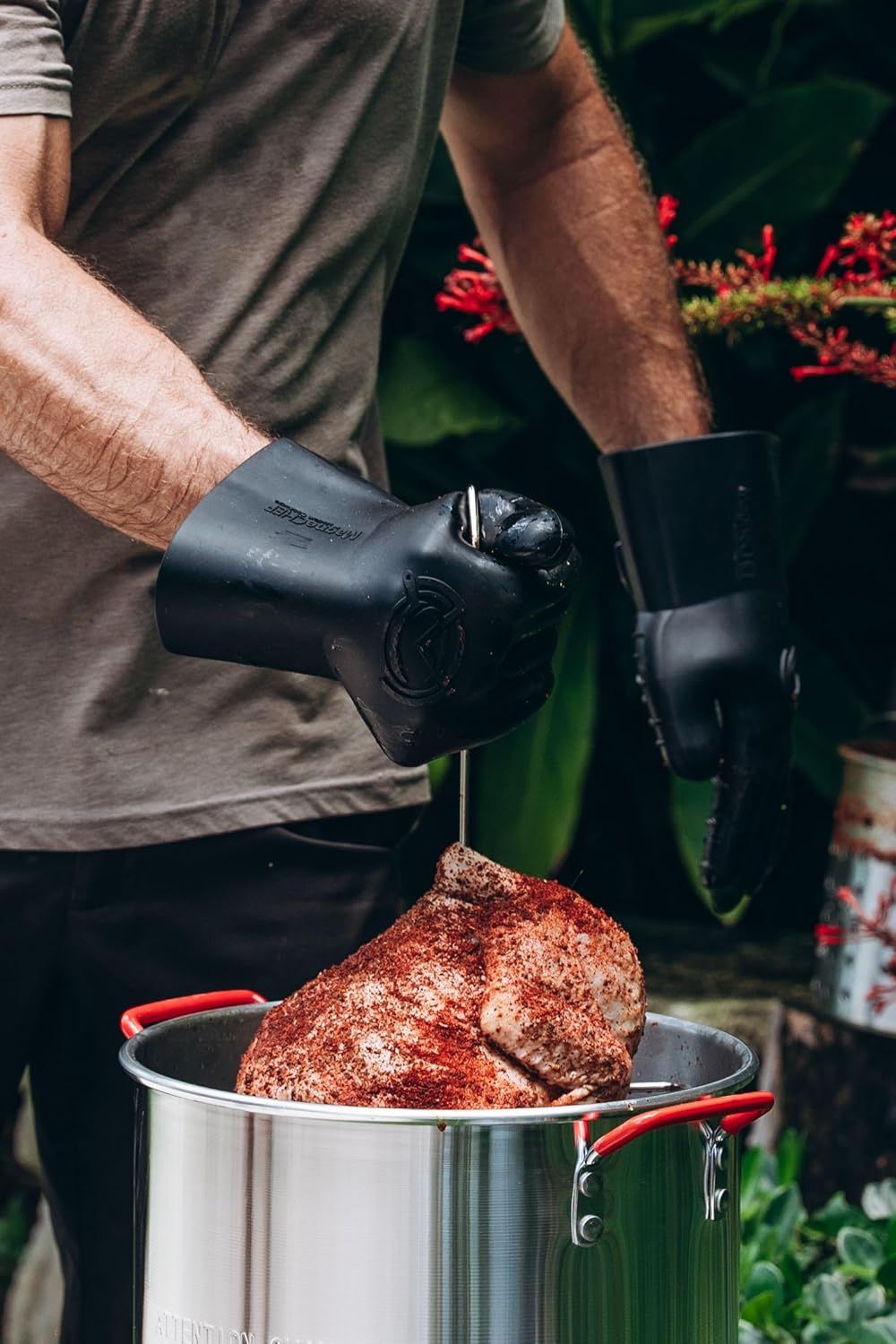 Shows the product being used in an authentic outdoor cooking scenario to help shoppers visualize how they would use it in real life.