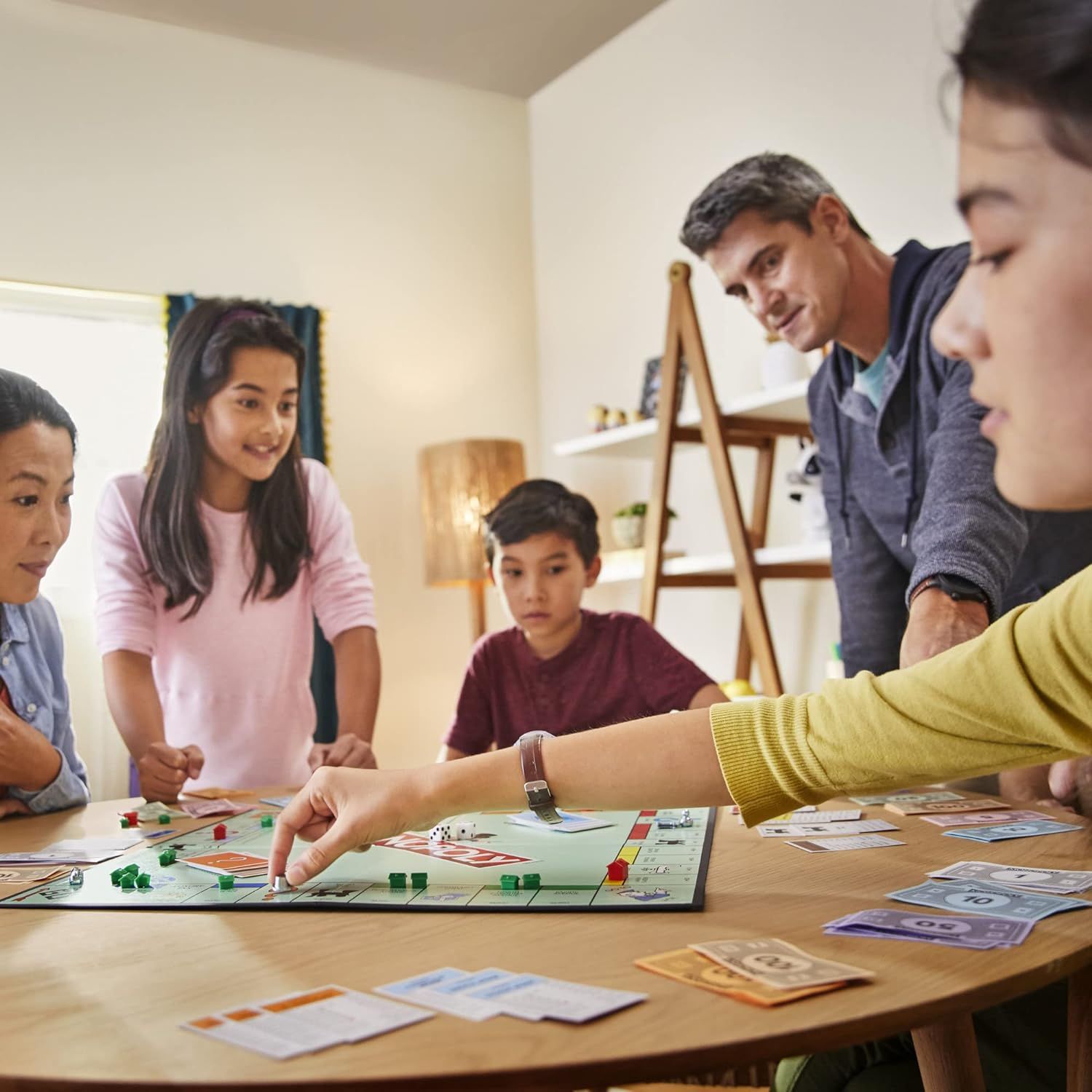 Shows the product being enjoyed in a real-world family setting to help shoppers visualize the product in their own homes and emphasize its role in bringing…