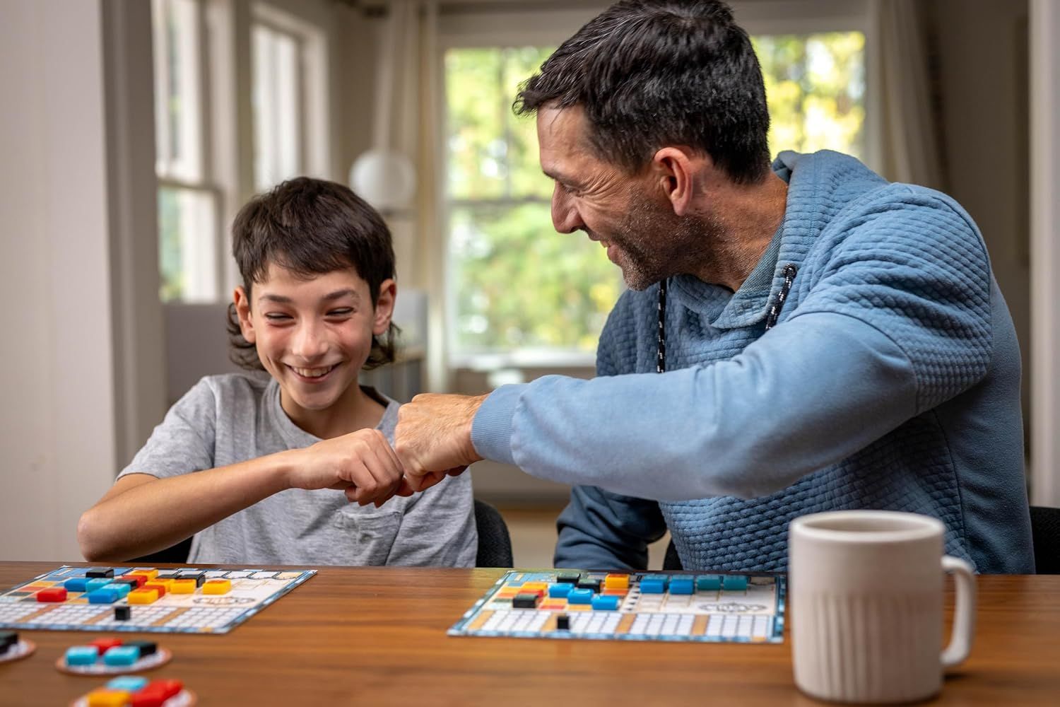 Demonstrates the product being enjoyed in a real-world home setting to create emotional connection and show the product brings families together for quality…