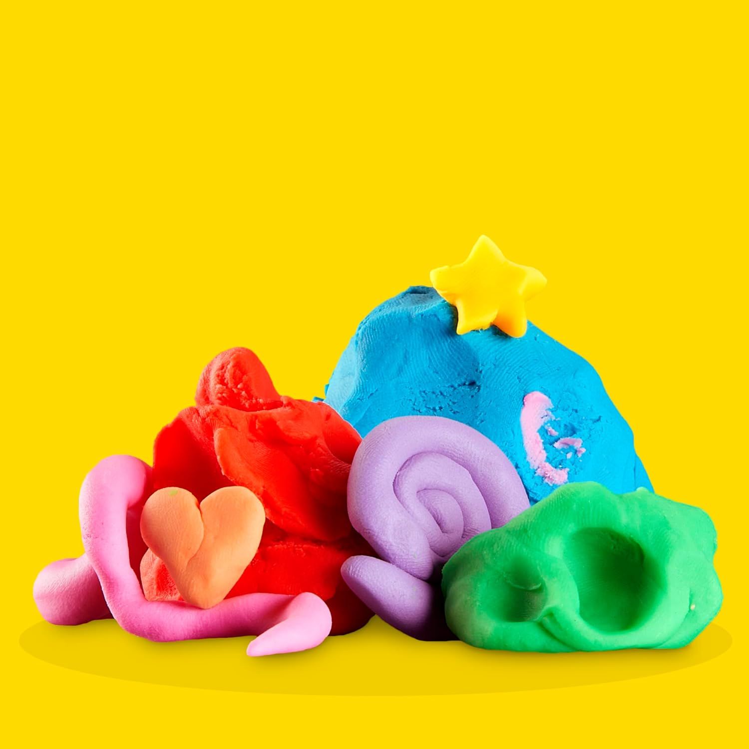 Shows the product in a clean, catalog-style format to give shoppers a clear view of the colorful play dough shapes and accessories included.
