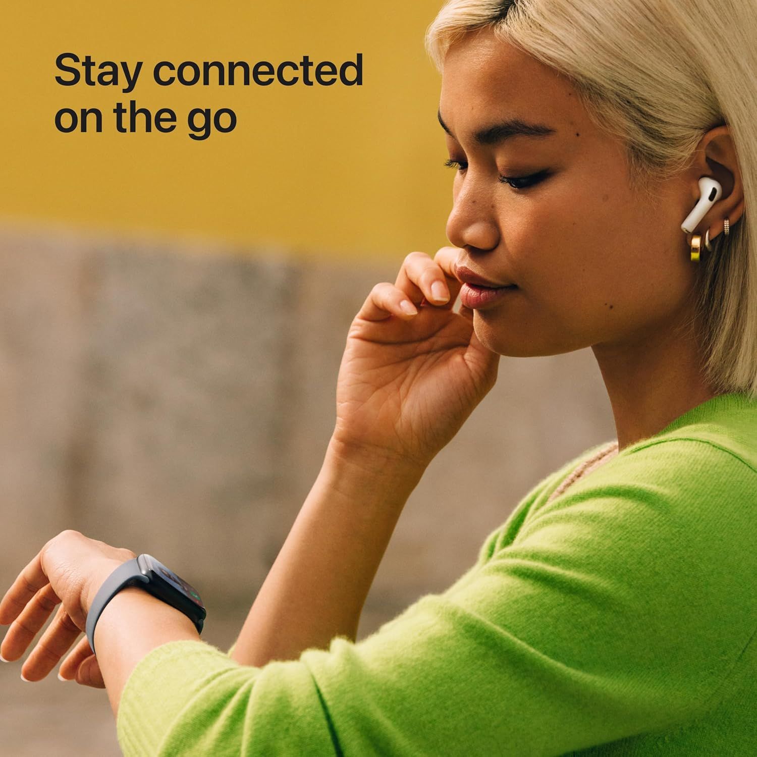 Communicates the benefit of staying connected while mobile, showcasing wireless earbuds and smartwatch working together for on-the-go connectivity.