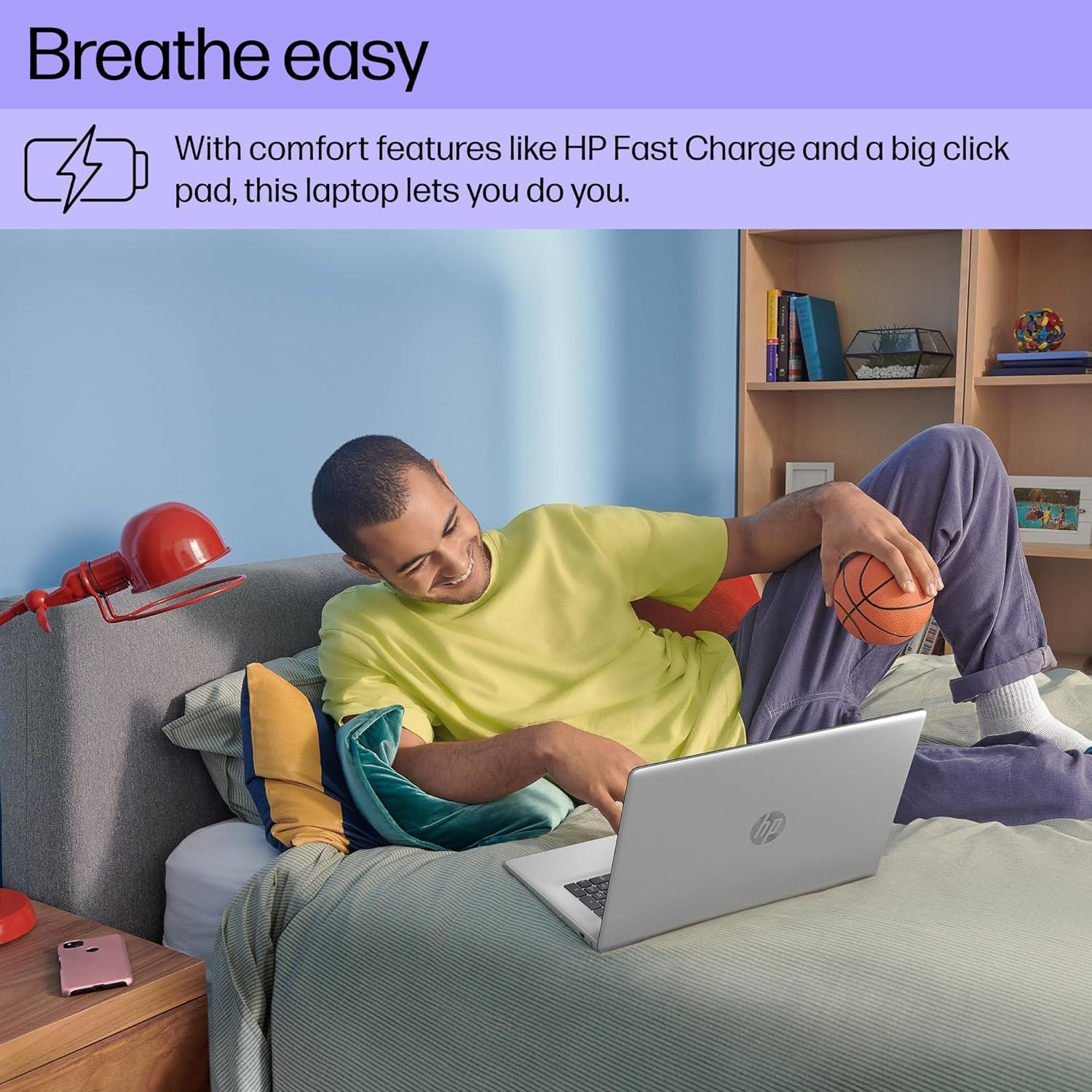 Communicates multiple comfort and convenience features of the laptop (fast charging and large clickpad) to position it as a stress-free, user-friendly device…