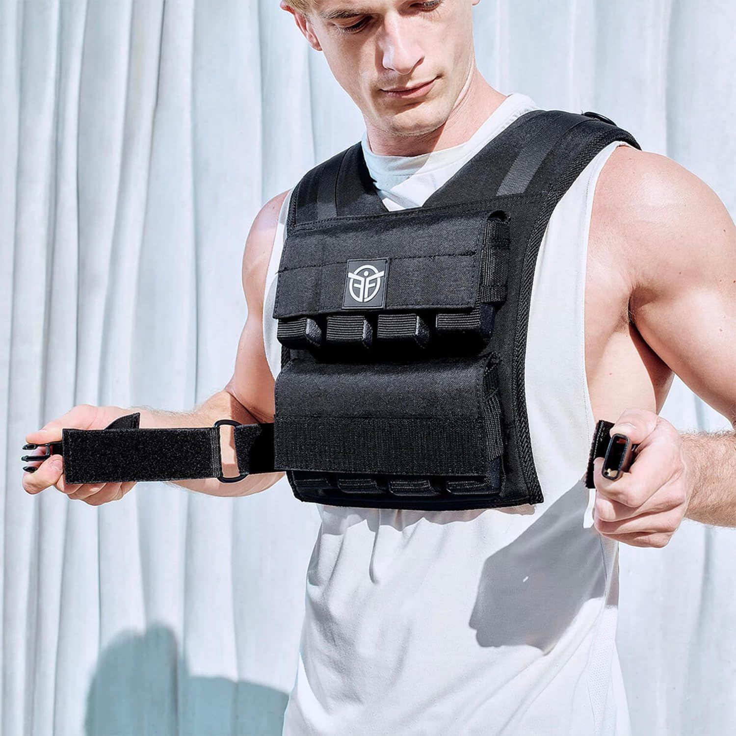 Demonstrates how to adjust and secure the weighted vest using the velcro straps, showing shoppers the ease of customizing the fit. Highlights the adjustable strap system that allows users to…