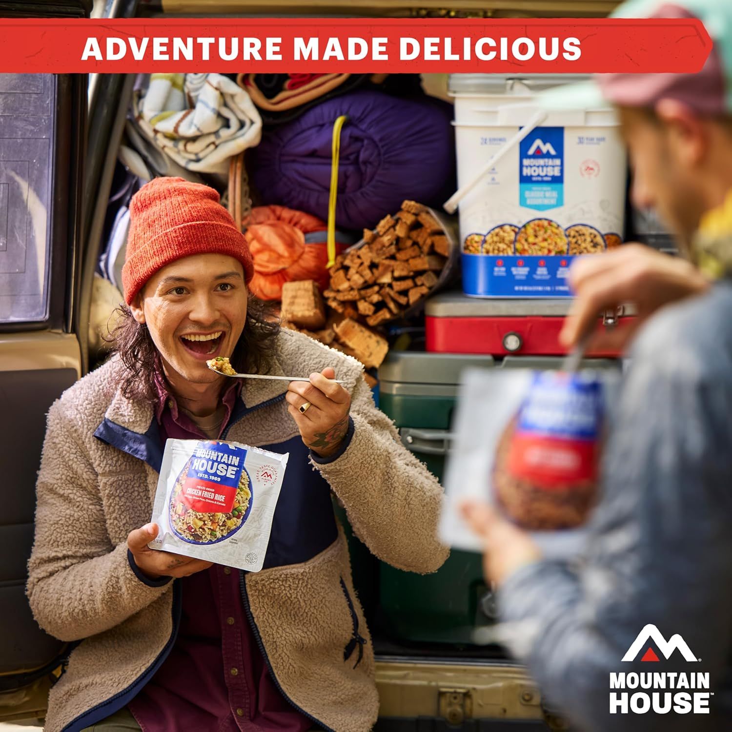 Showcases the product being enjoyed in a real-world outdoor/camping setting to help shoppers envision using the freeze-dried meals during their own adventures…