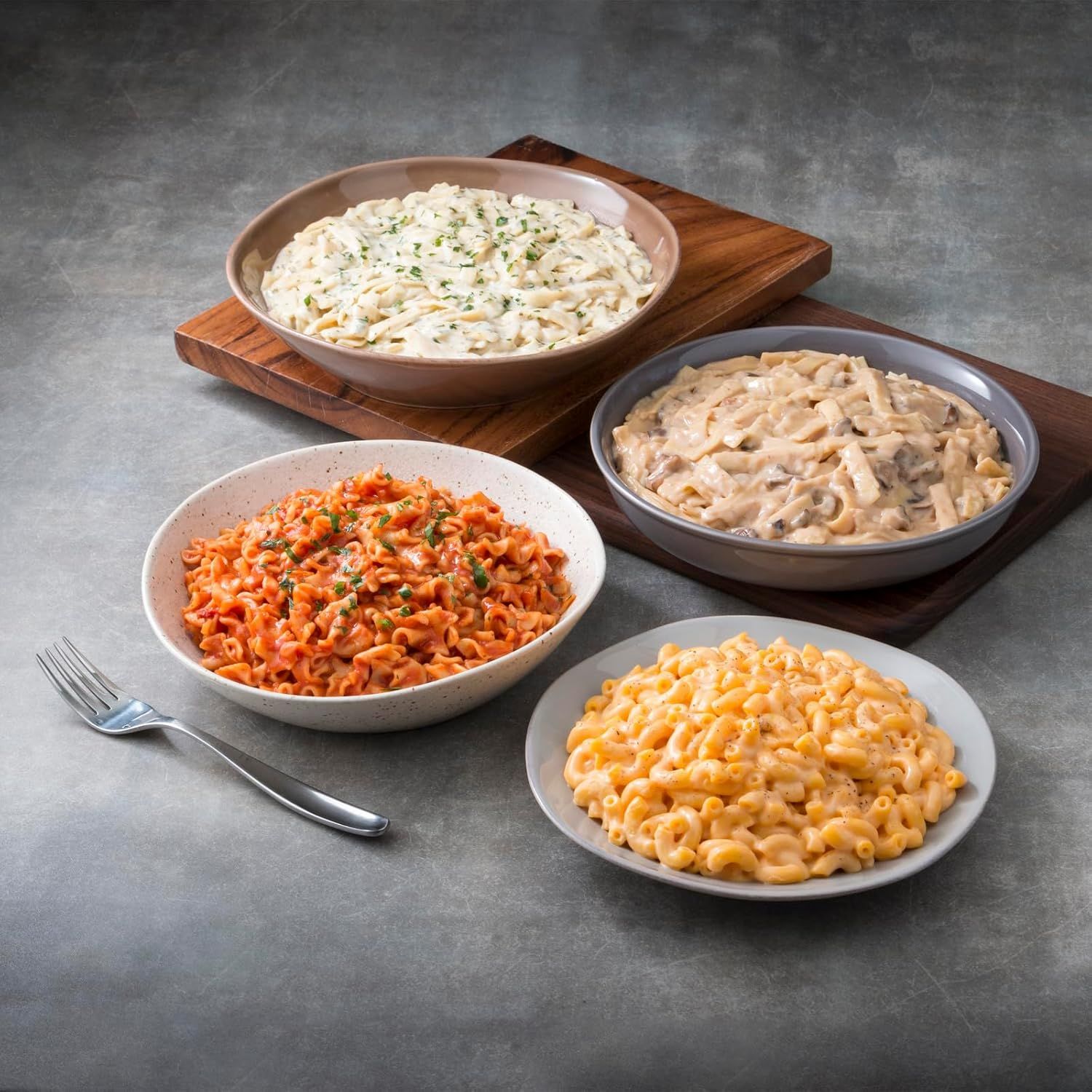 Showcases the brand's product portfolio by displaying multiple pasta varieties side-by-side, helping shoppers understand the range of flavors and options…