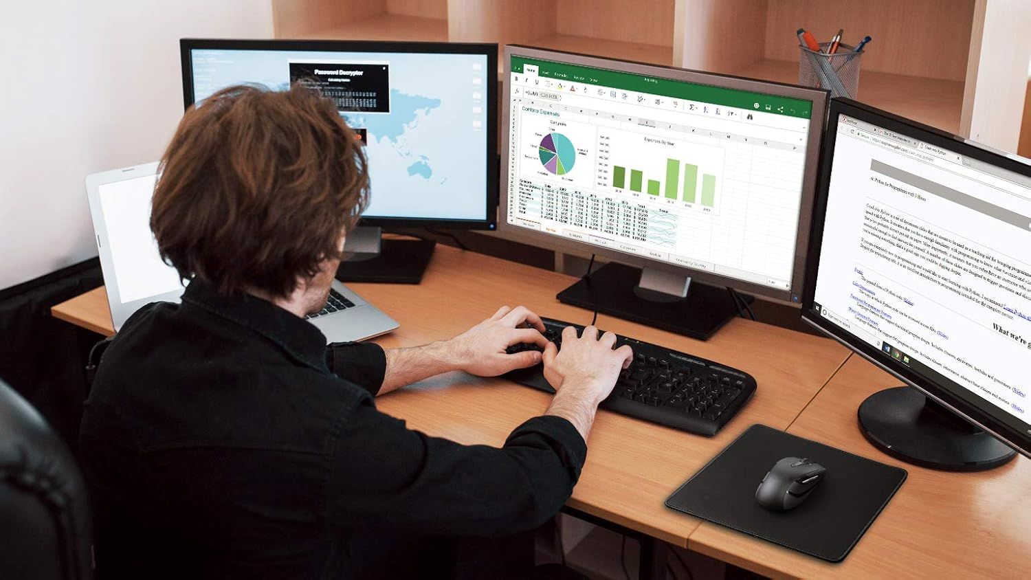 Demonstrates the product in a real-world professional office setting, showing how it enables a productive multi-screen workflow for business or data analysis tasks.