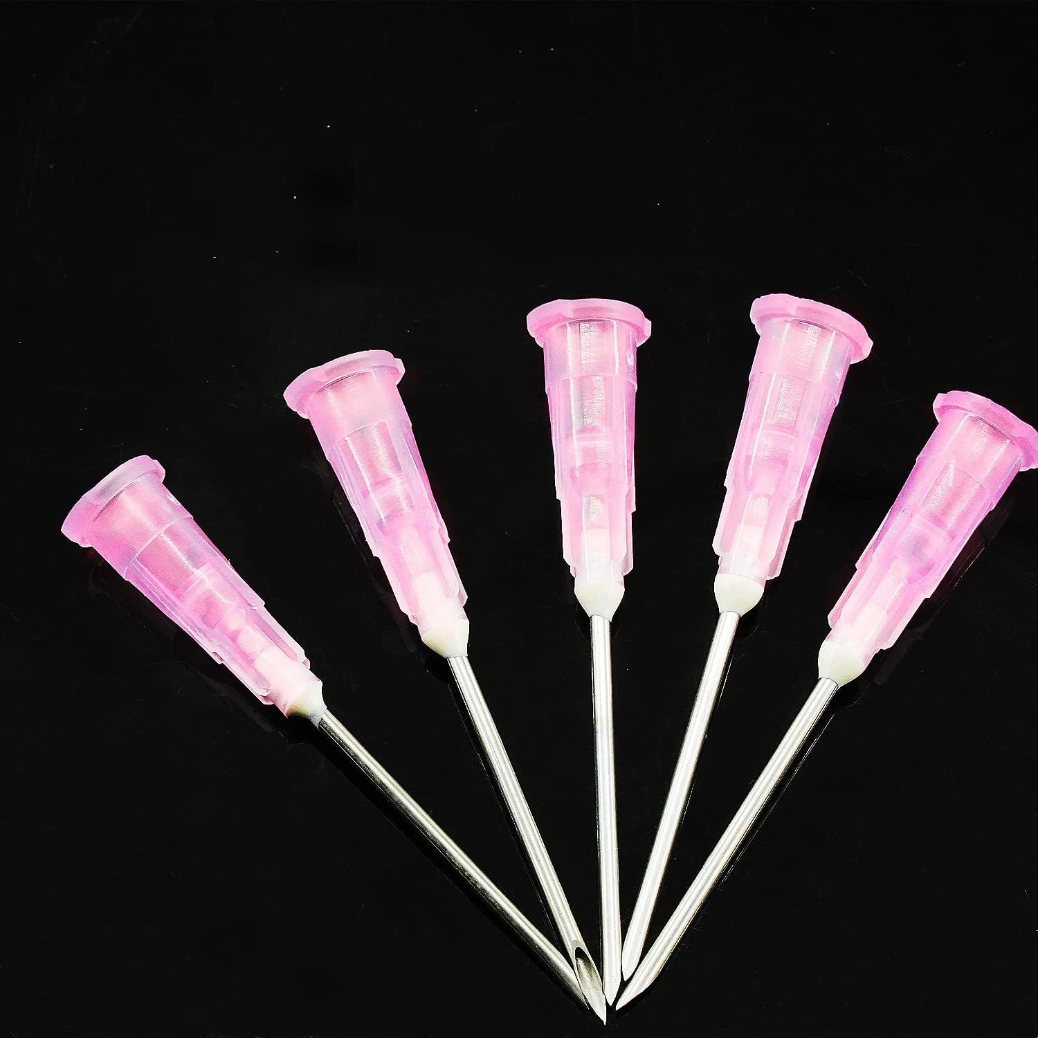 Provides a clean, catalog-style view of the product (pink dispensing needles/tips) against a neutral background to show the product clearly without distractions.