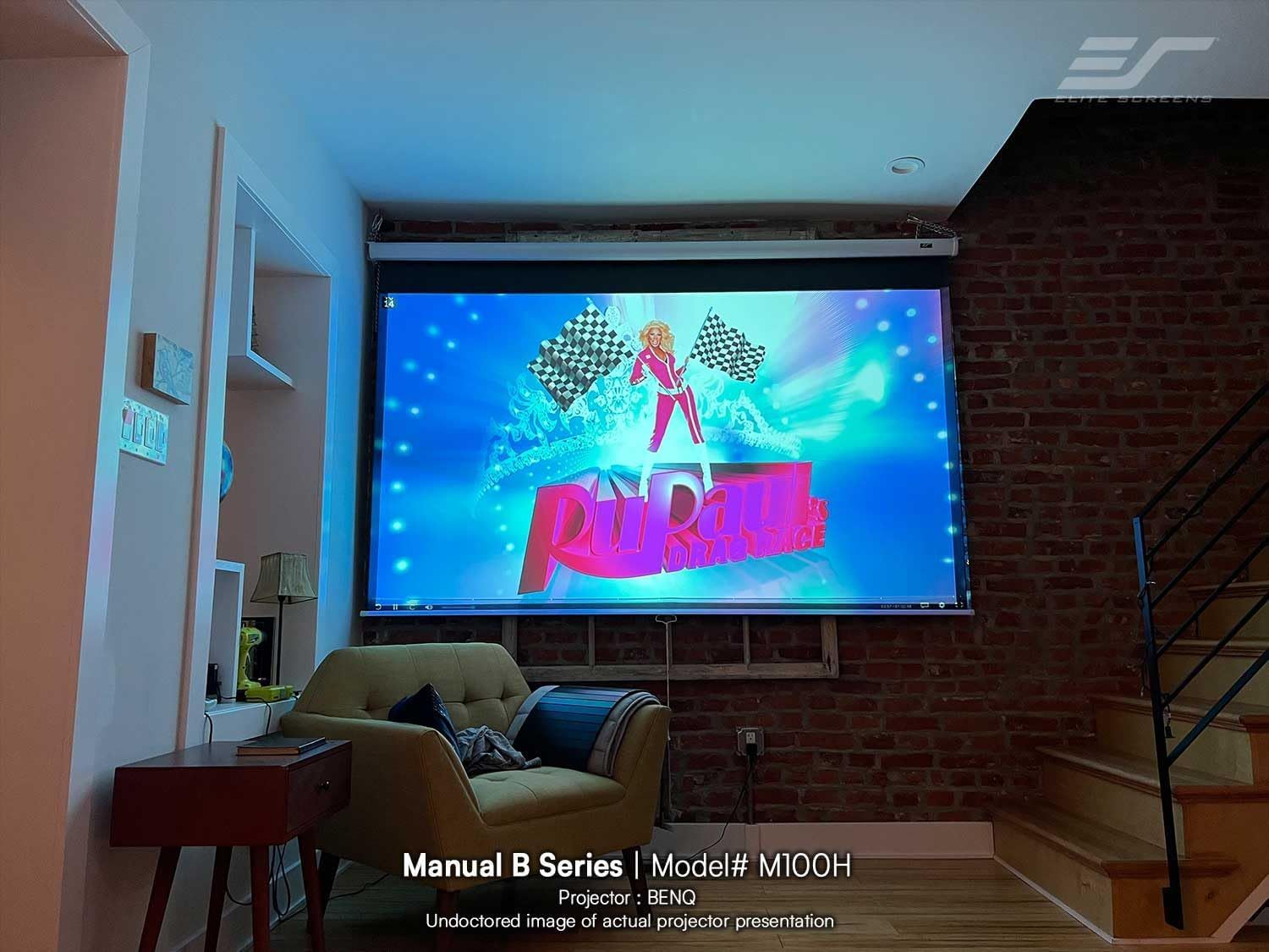 Demonstrates the projector screen installed in a real-world living space to help shoppers visualize how the product looks and functions in an actual home…
