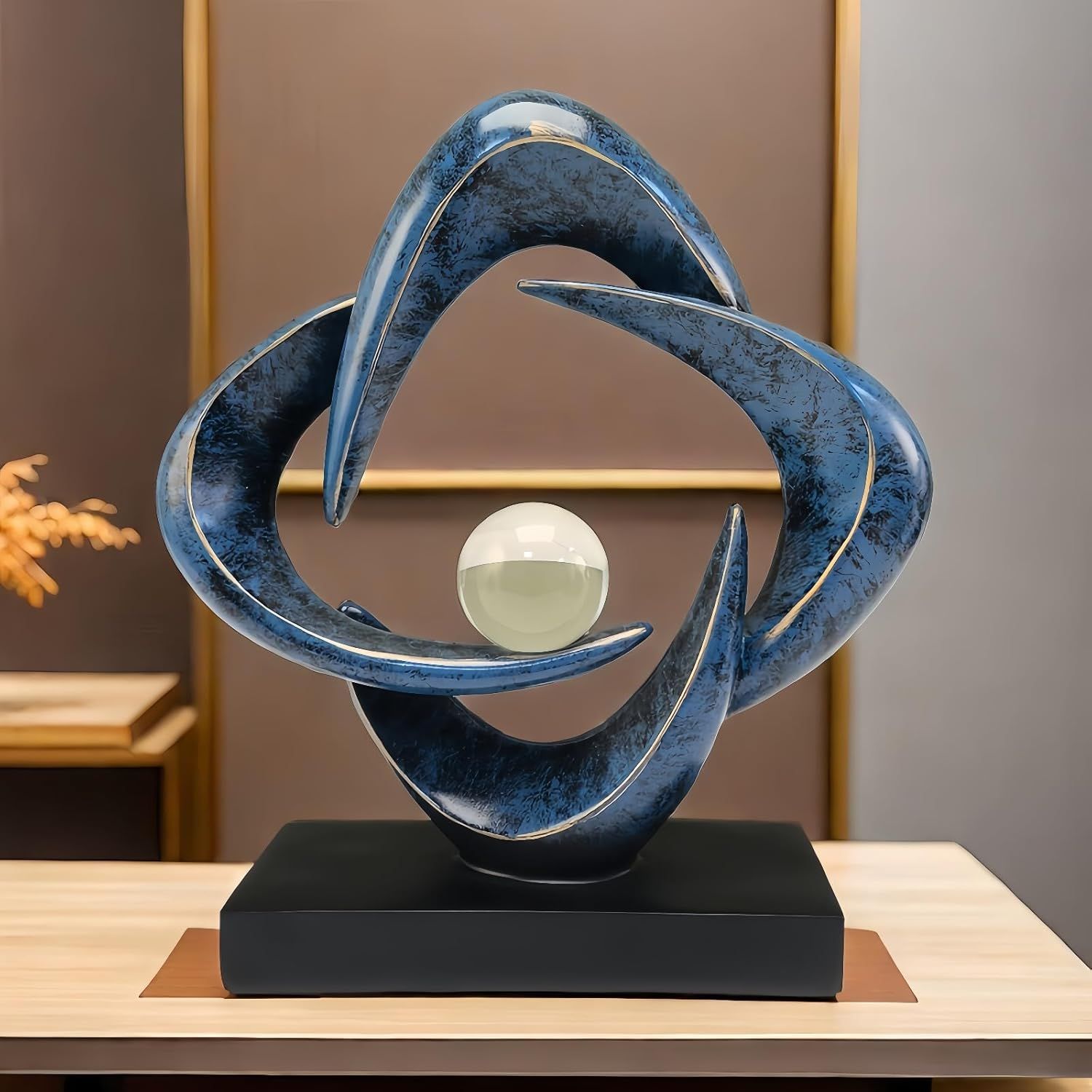 Showcases the product as an elegant decorative piece in a styled home or office environment to help shoppers visualize it in their own space.
