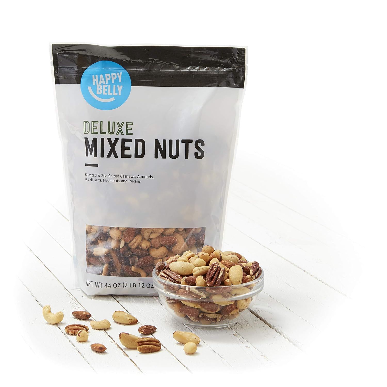 Shows the customer exactly what they receive in the package—a variety of deluxe mixed nuts including cashews, almonds, brazil nuts, hazelnuts, and pecans—to…