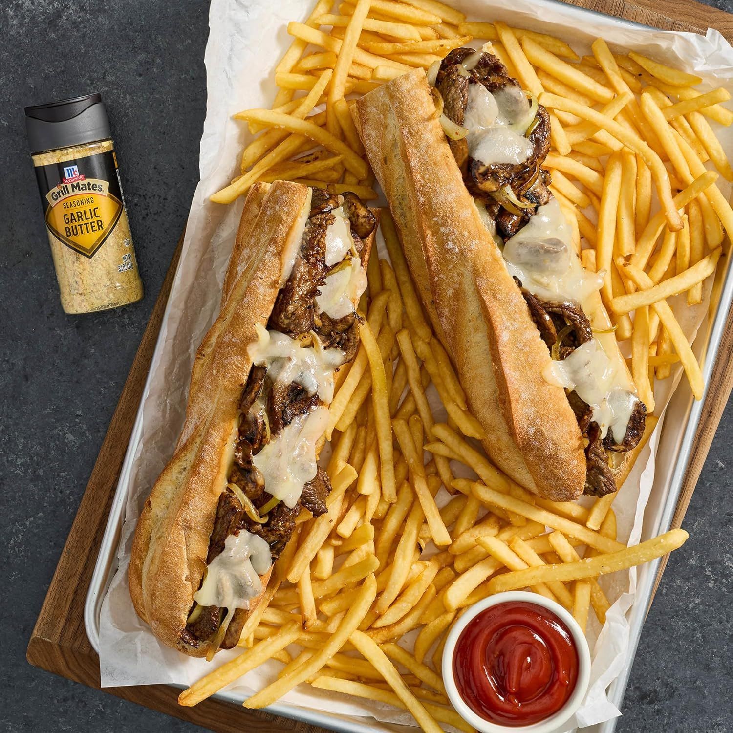 Showcases the product (cheesesteaks and fries) in an appetizing, real-world serving context to help shoppers visualize the meal experience and appeal to their…