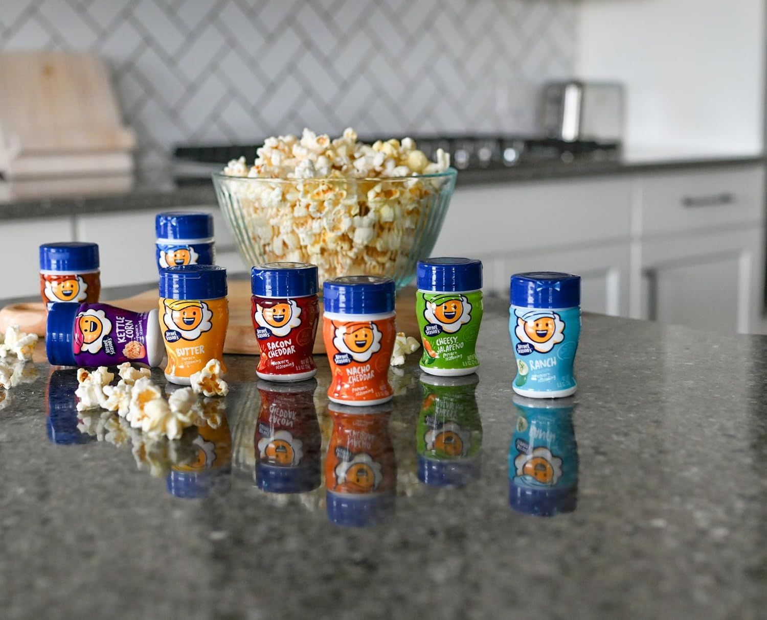 Shows the product line in an authentic home kitchen environment with popcorn to demonstrate real-world usage and create an appealing, relatable context for…