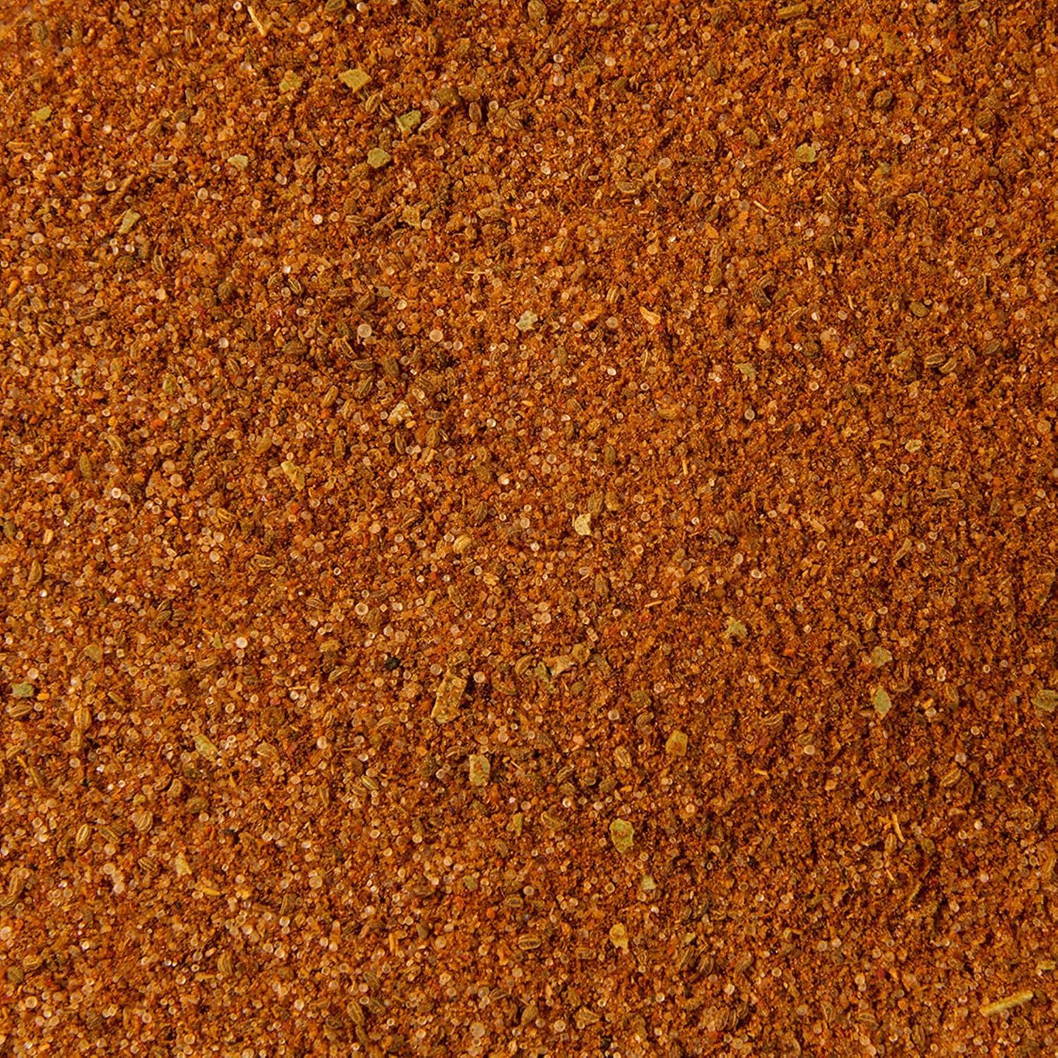 Displays the fine texture and composition of the spice blend or seasoning product to help shoppers visualize the product quality and consistency.