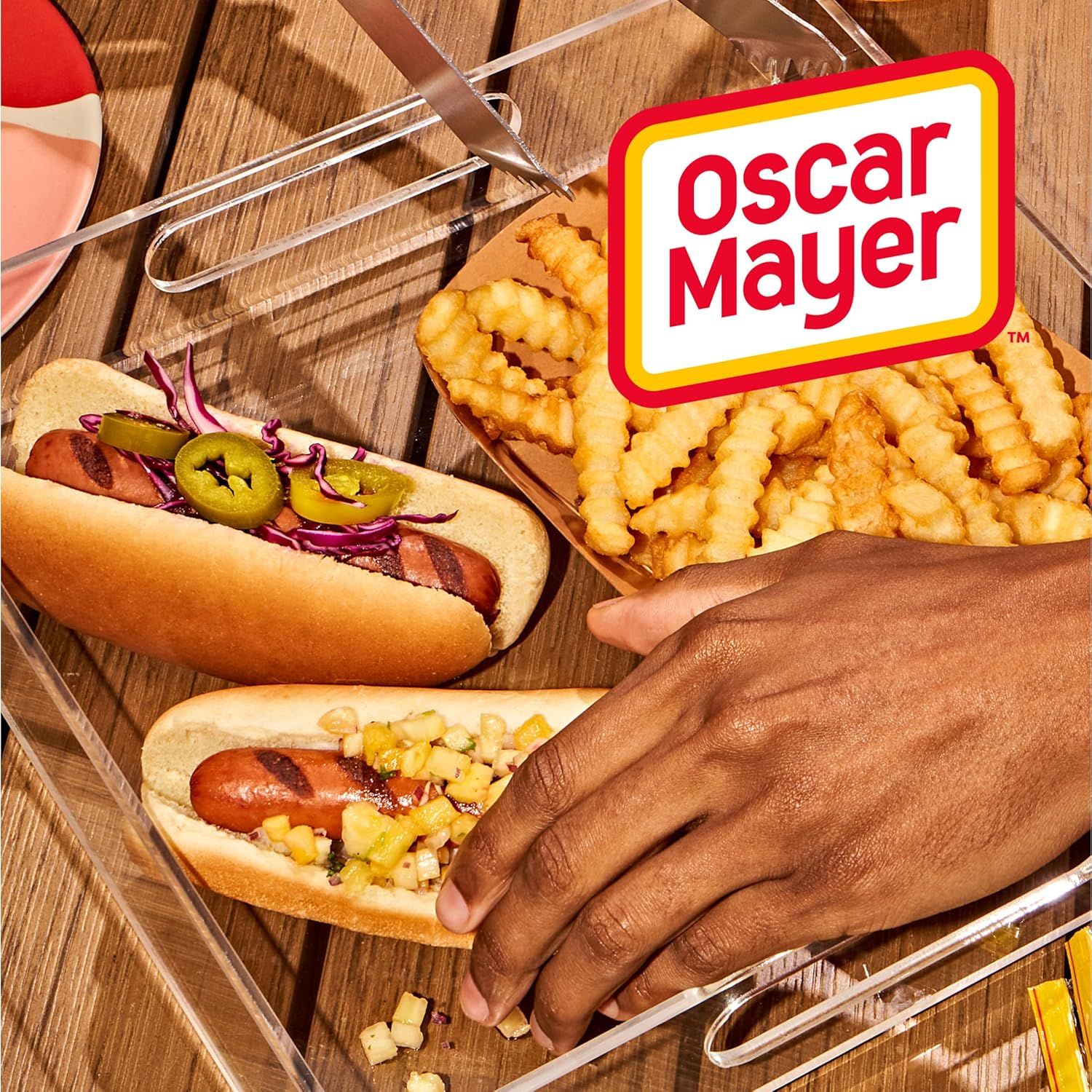 This image showcases the Oscar Mayer brand prominently in a lifestyle setting, reinforcing brand recognition and associating the brand with enjoyable outdoor…
