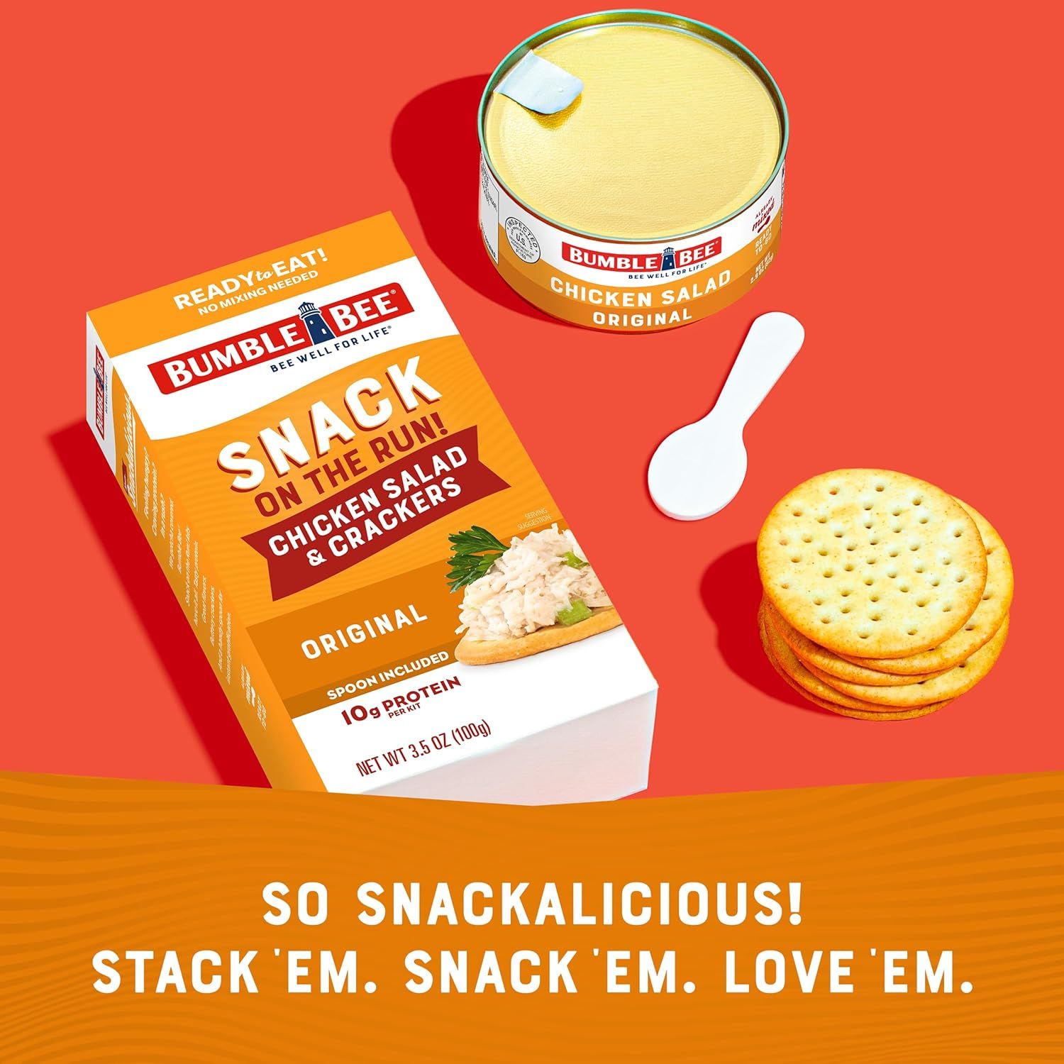 Shows everything included in the snack kit—chicken salad, crackers, and spoon—to help shoppers understand the complete ready-to-eat package they're…