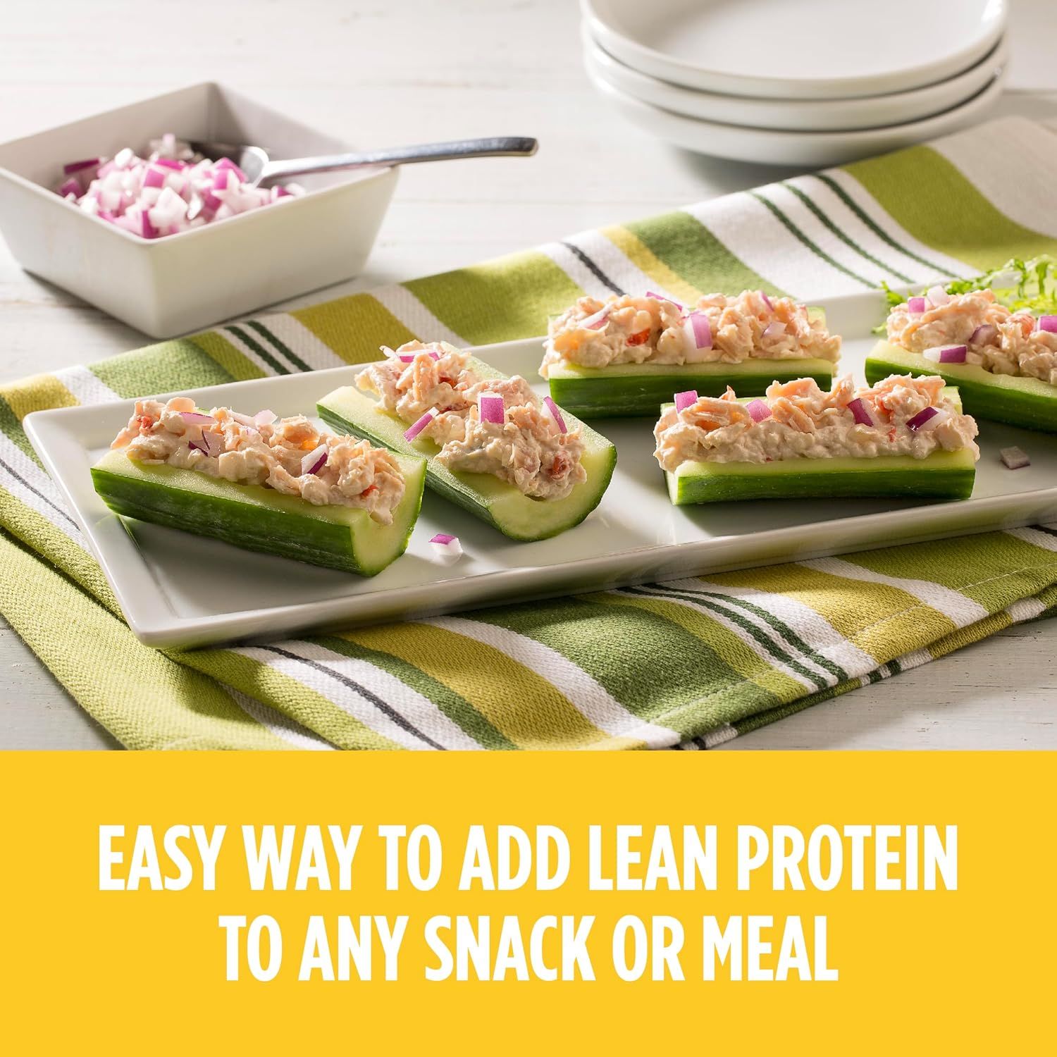 Demonstrates a creative use case for the product by showing how it can be used to add lean protein to snacks or meals, inspiring shoppers with a practical serving suggestion. Communicates the key…