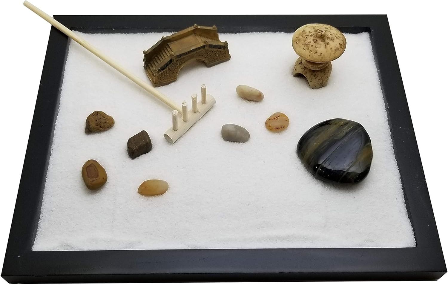 Shows all the components included in the zen garden set, helping shoppers understand the complete package they will receive with their purchase.