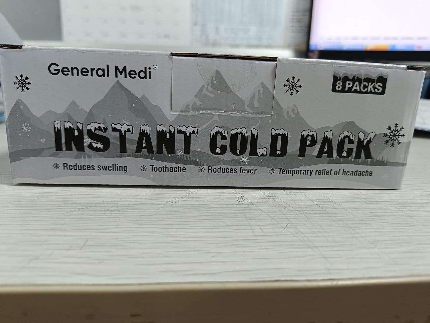 Communicates multiple therapeutic benefits of the instant cold pack in a single view, showing shoppers the product's versatility for treating various pain and inflammation conditions.