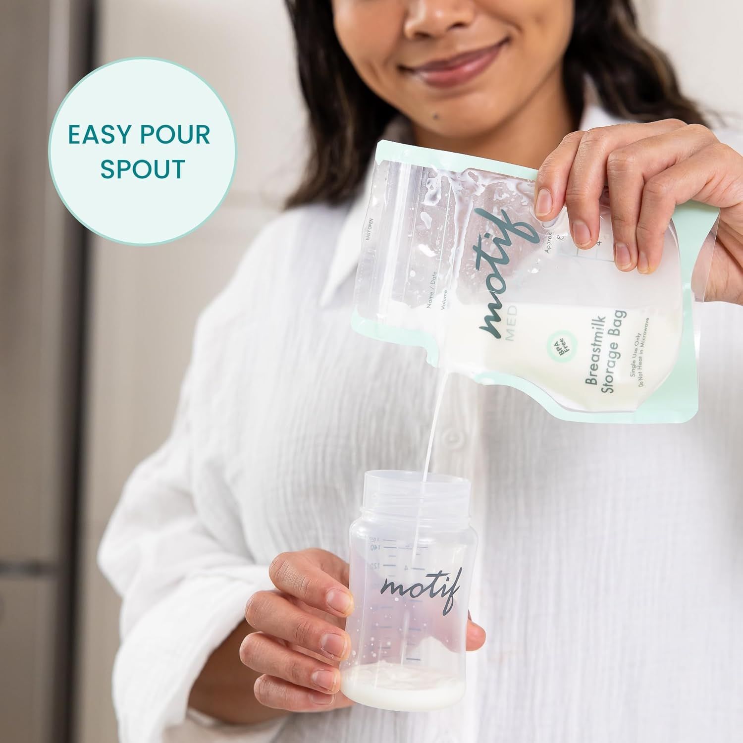 Demonstrates the convenience of the easy pour spout feature on the breastmilk storage bag, showing how simple it is to transfer milk into a bottle.