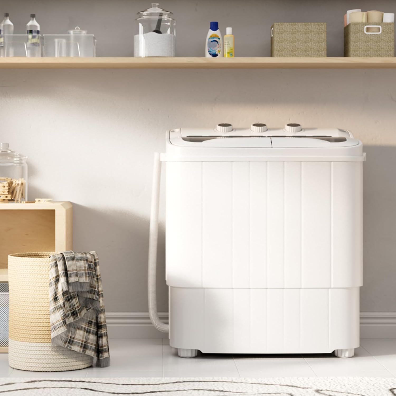 Shows the portable washing machine in a realistic home environment to help shoppers visualize how it fits into their living space and daily routine.