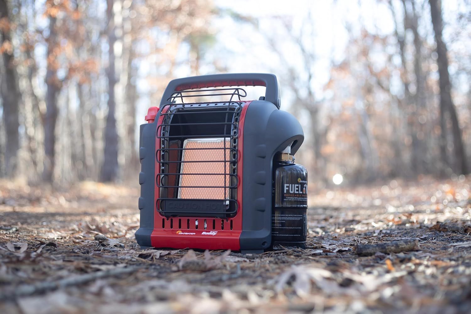 Demonstrates the product in a real-world outdoor setting to show shoppers where and how the portable heater can be used in nature or camping scenarios.