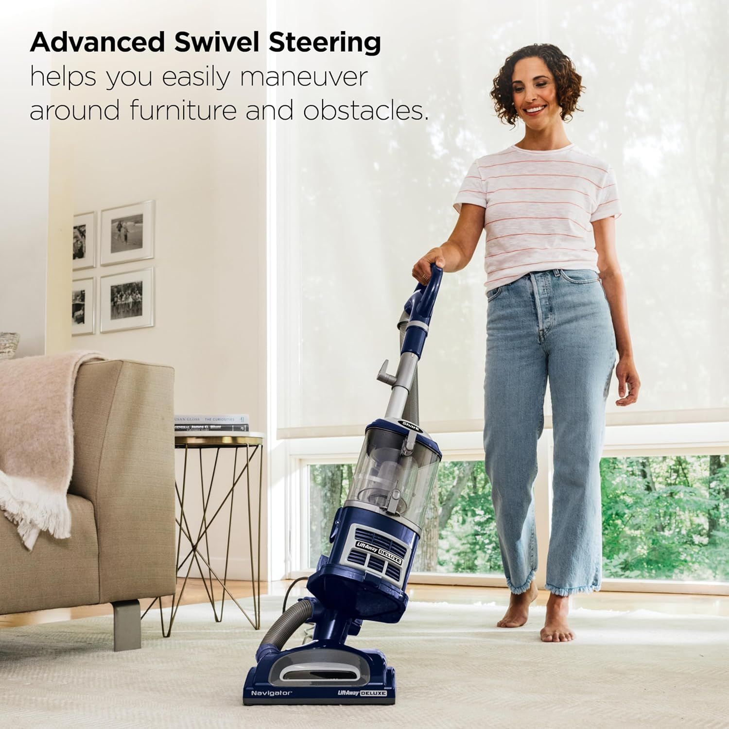Demonstrates the vacuum's swivel steering feature, showing how easily it can navigate around furniture and obstacles in a home setting to reassure shoppers of…