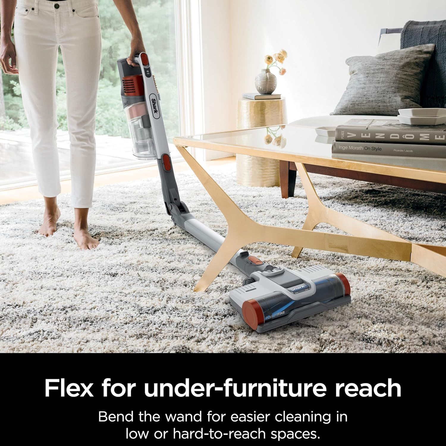 Demonstrates the vacuum's flexible wand feature that allows users to easily clean under furniture and hard-to-reach spaces, solving a common cleaning pain…