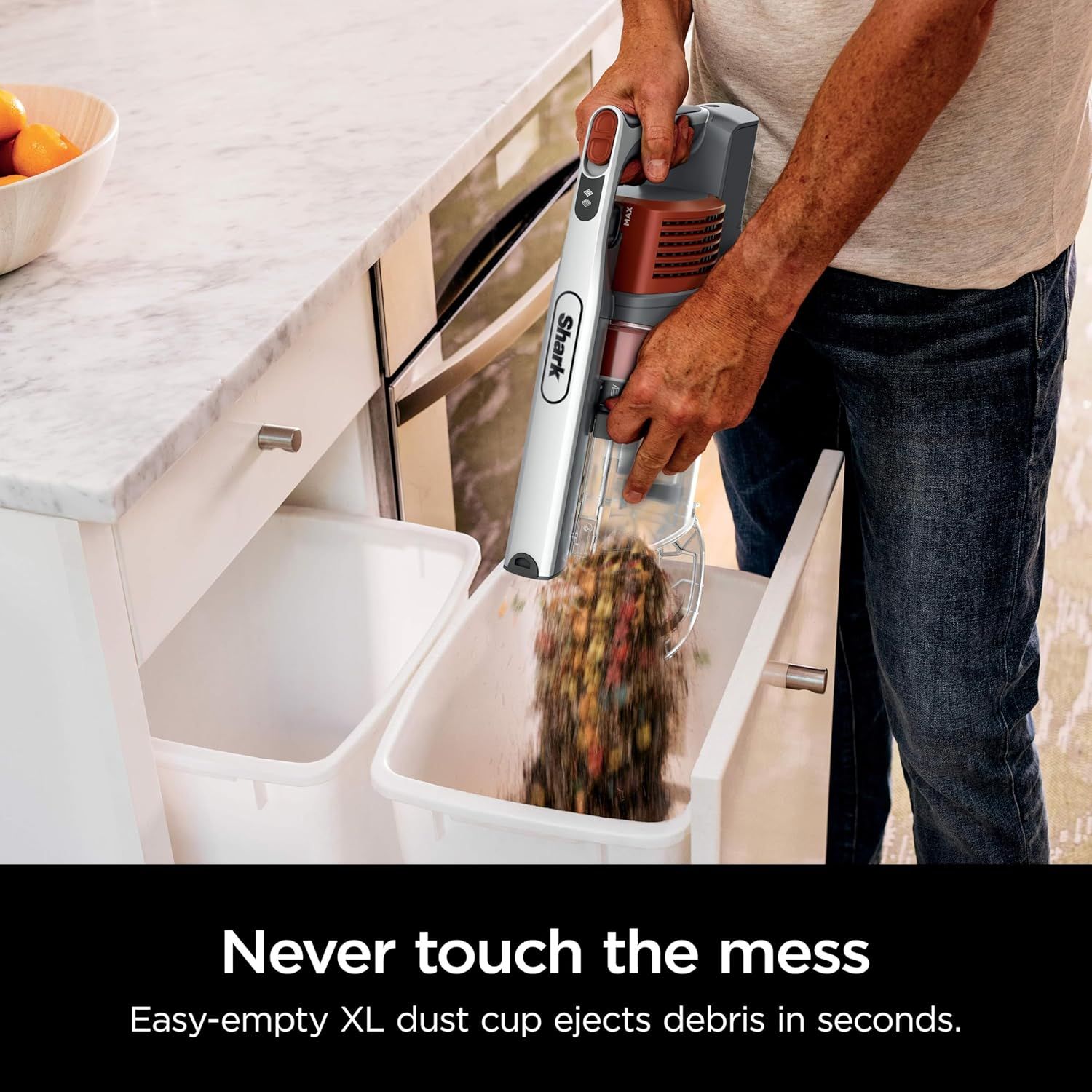 Demonstrates the convenience and hygiene of the XL dust cup's one-touch ejection system, reassuring shoppers they can dispose of debris quickly without…